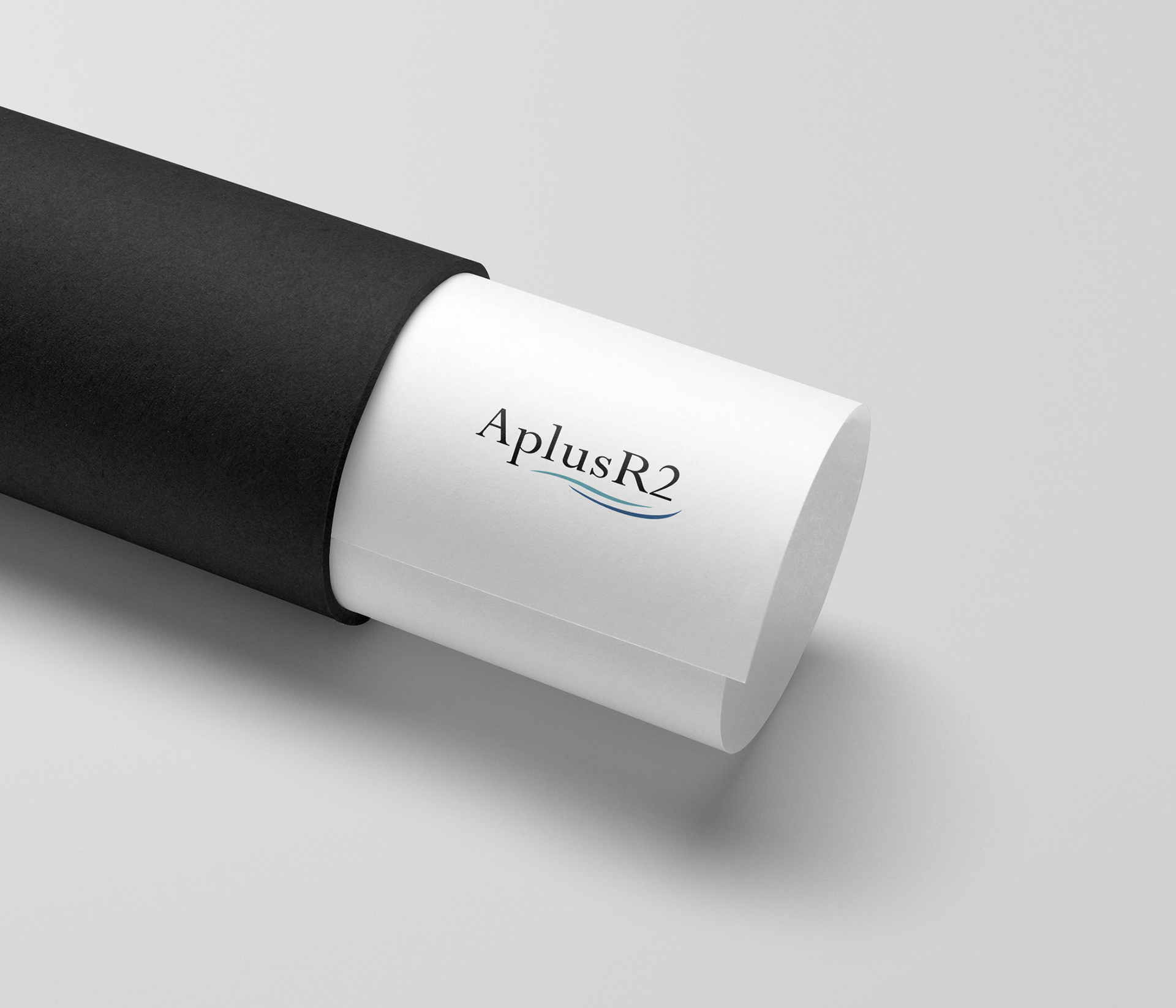 Luxurious and relaxing new logo design for van rental business called AplusR2, imagined here on a roll of white paper