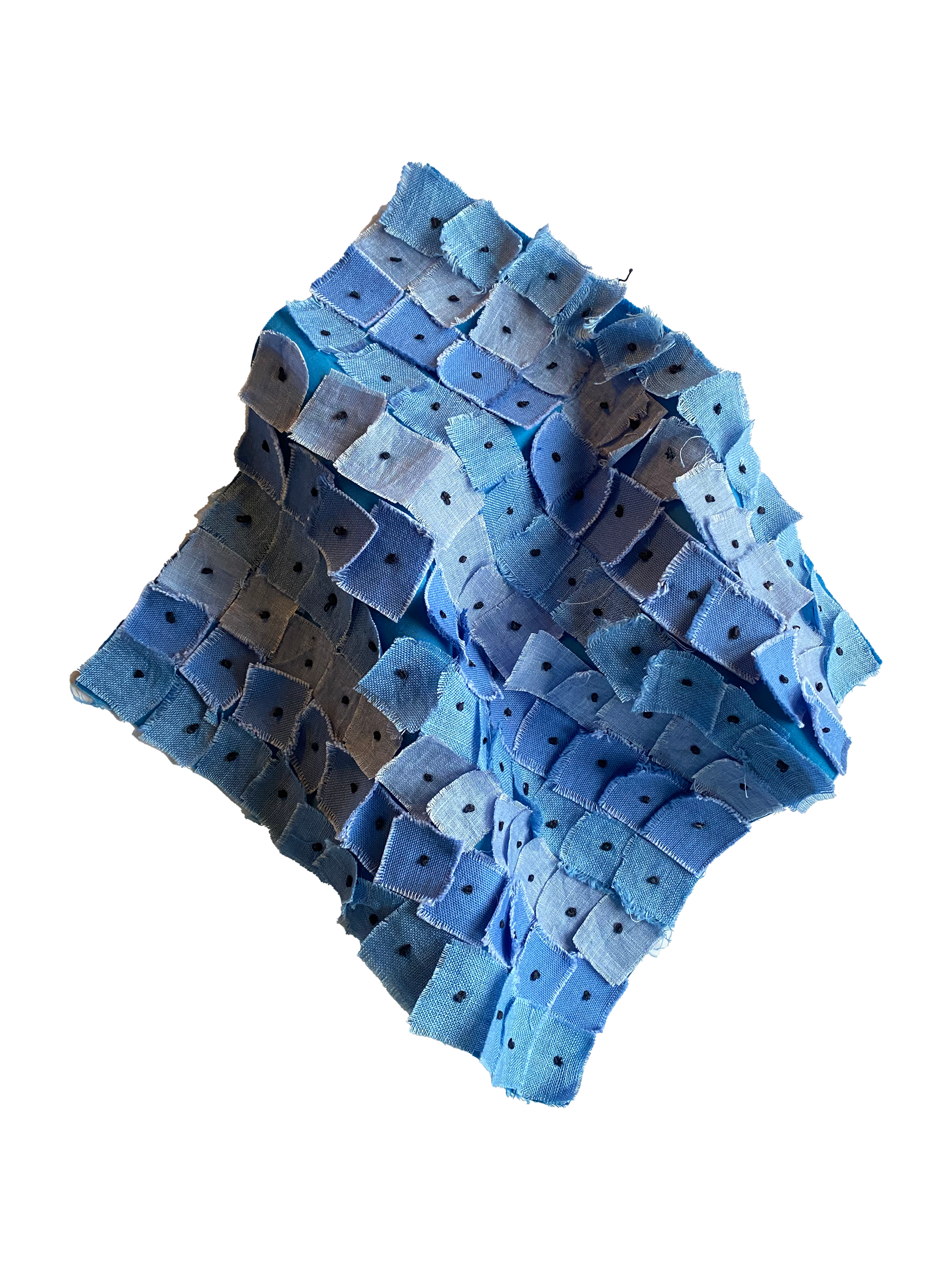 knot embroidering of fabric squares on dyed cotton