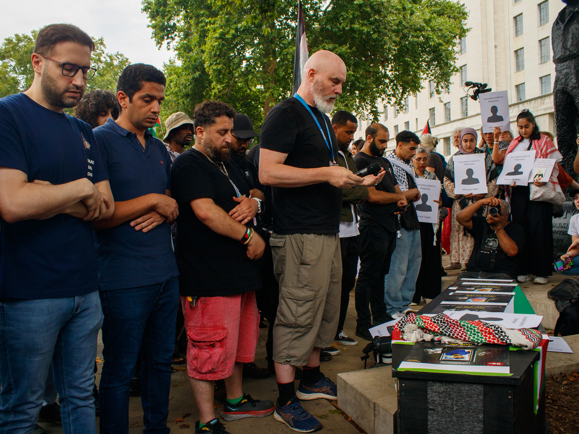 August 13th, 2025 - Protesters pray at a vigil for murdered journalists in Palestine 