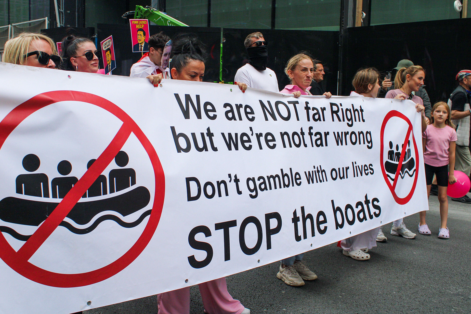 August 31st, 2025 - Pink Ladies lead a protest through Canary Wharf