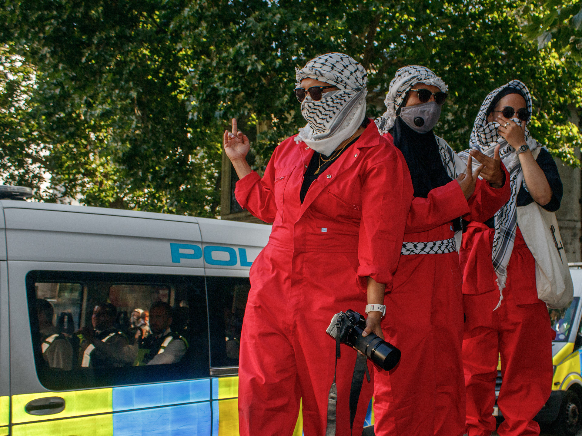 July 4th, 2025 - Palestine Action protesters outside of the Royal Courts of Justice while the group launch their legal challenge against their proscription