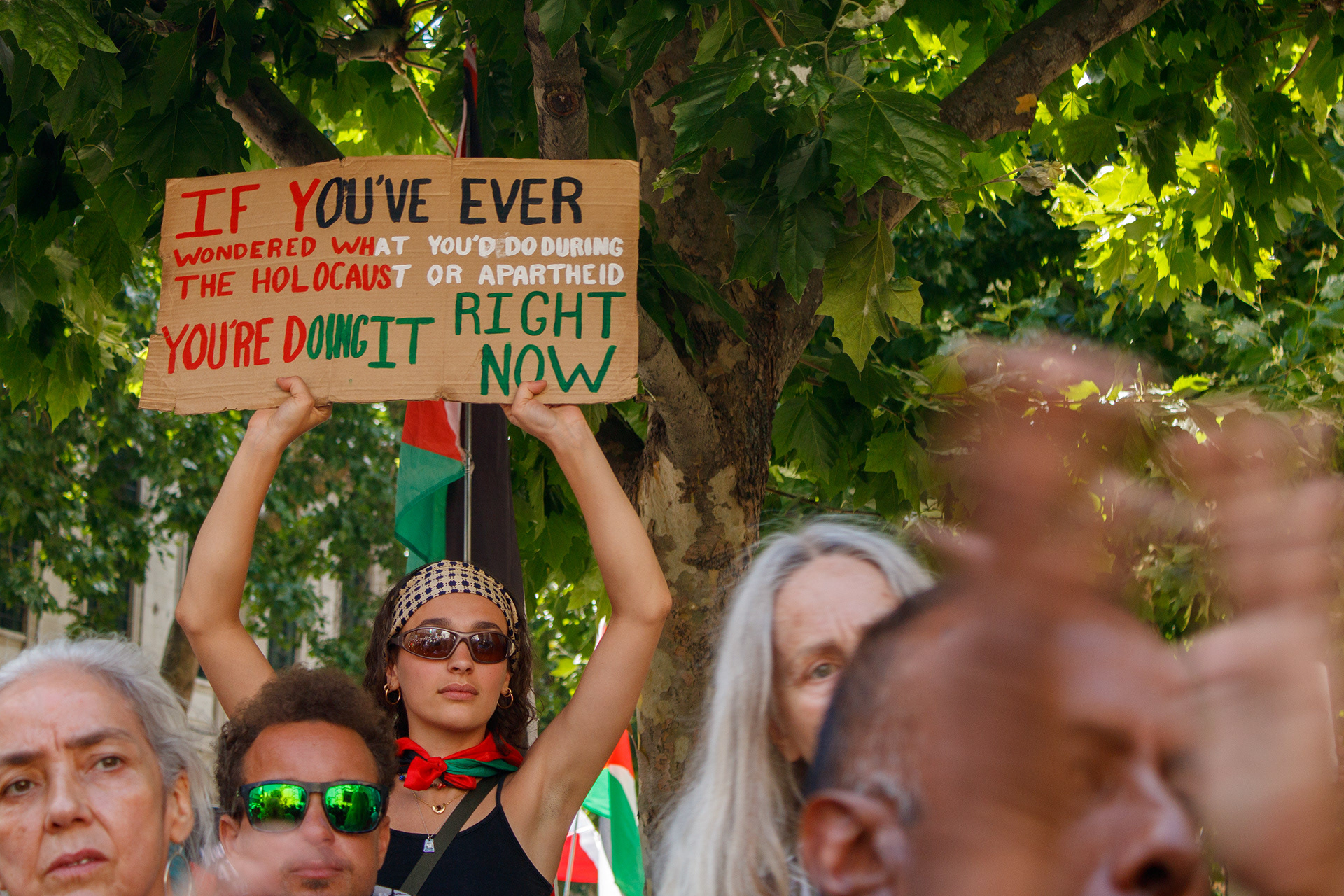 July 4th, 2025 - Palestine Action protesters outside of the Royal Courts of Justice while the group launch their legal challenge against their proscription