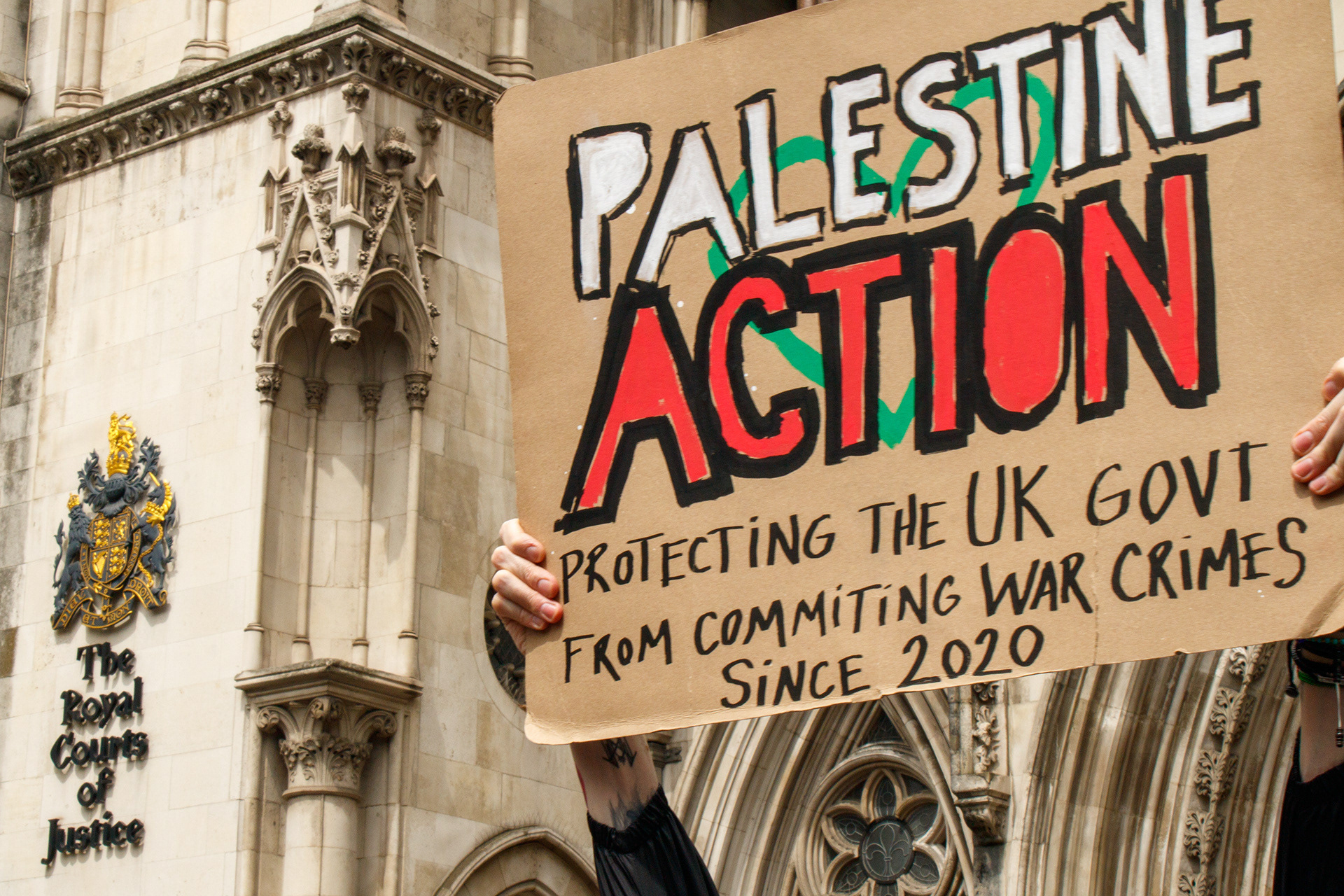 July 4th, 2025 - Palestine Action protesters outside of the Royal Courts of Justice while the group launch their legal challenge against their proscription