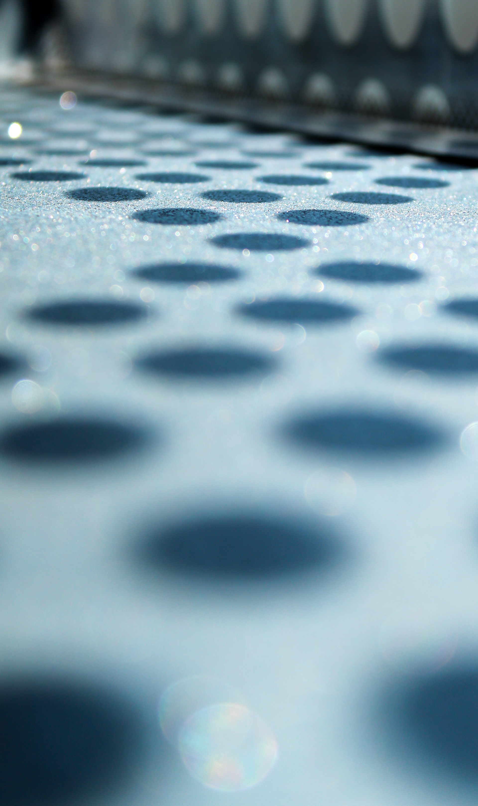 June 20th, 2024 - Dots through a window on a bus