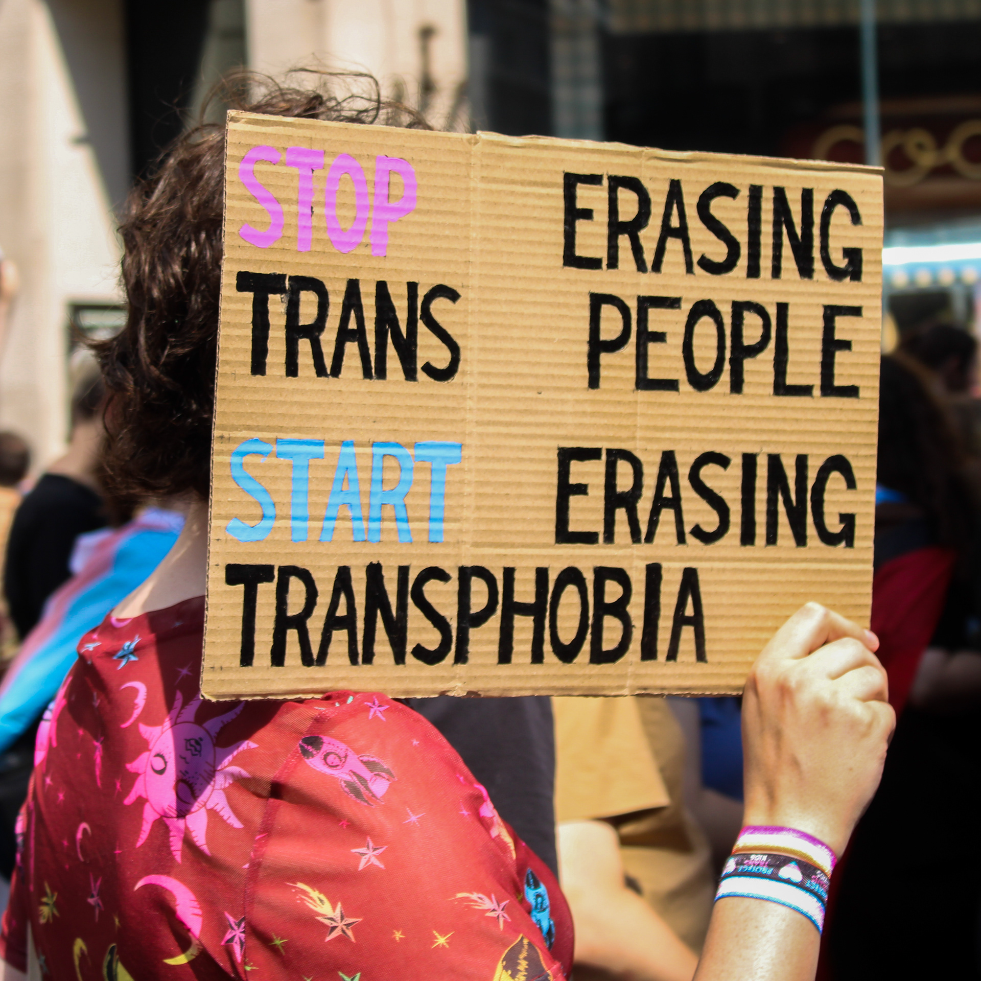 July 27th, 2024 - A trans rights activist holds a sign