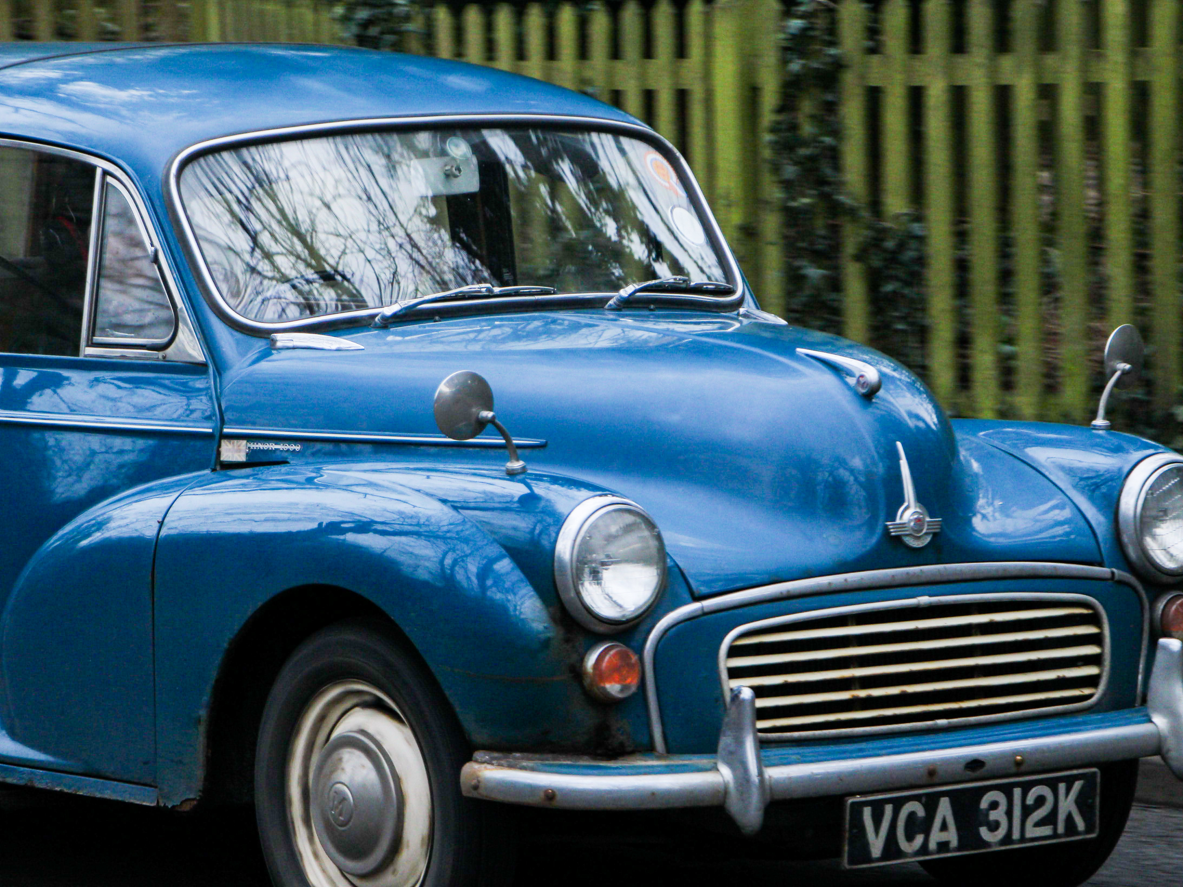 January 29th, 2026 - A car passing through a small village 