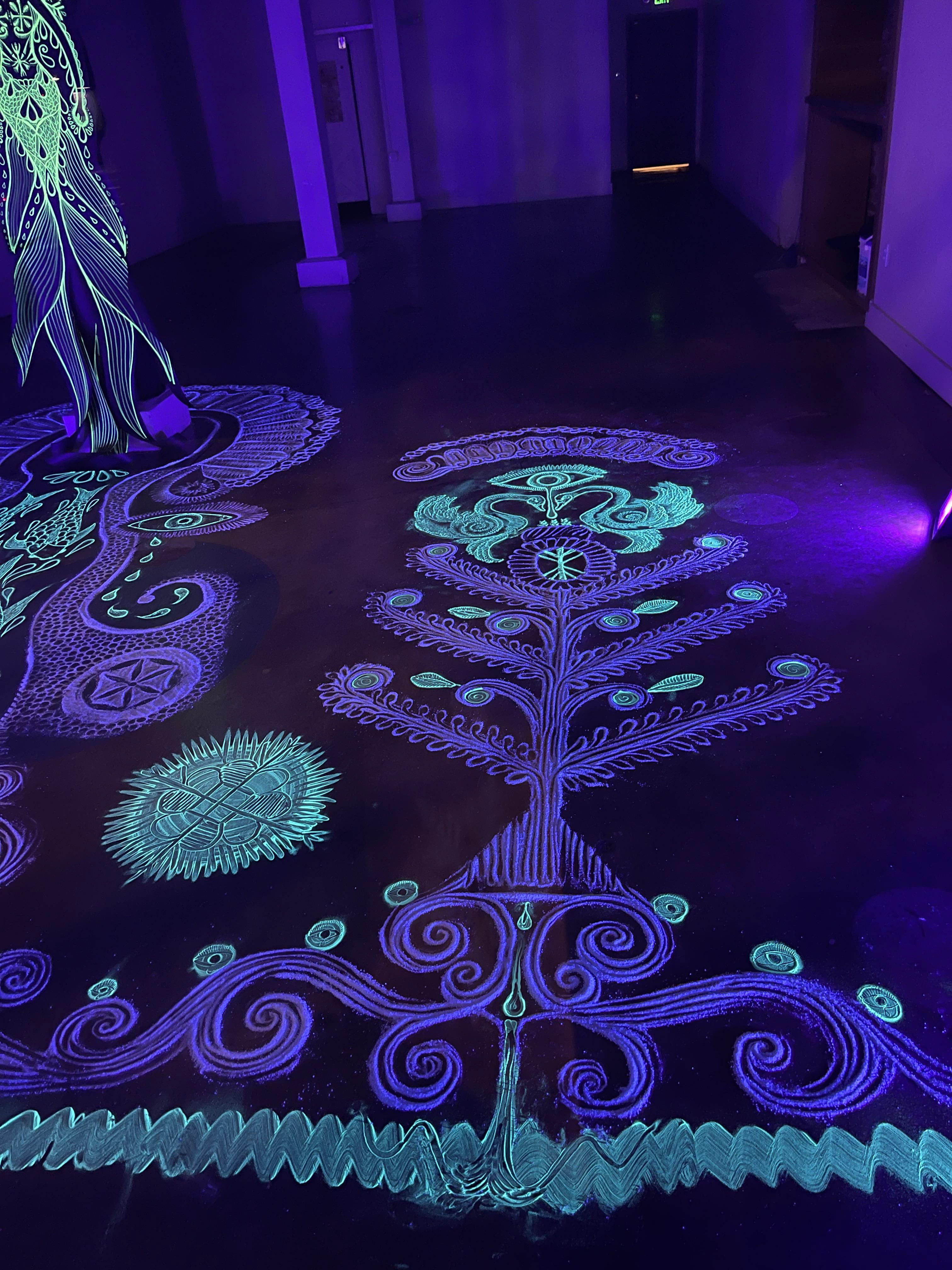 The Tree of Life, a common symbol for Slavic and Baltic designs. The roots signify the underworld, the trunk and branches are mortal family, and the birds are witnesses to human life (and manifestations of the Sun Goddess Saule, or water spirits in other mythologies).