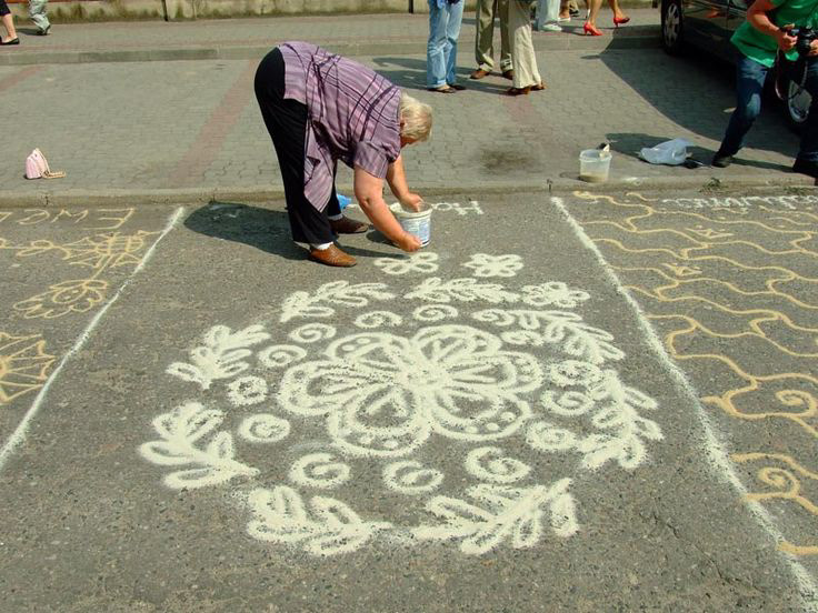 "Sypanie piaskiem," or the pouring of sand, is a part of the intangible cultural heritage of rural Central Poland. Patterns drawn on the ground in houses, thresholds, pathways, and courtyards brought protection and luck to families and community. The practice almost became extinct during the past 100 years, but is experiencing a recent resurgence as people seek to revive this cultural practice.
