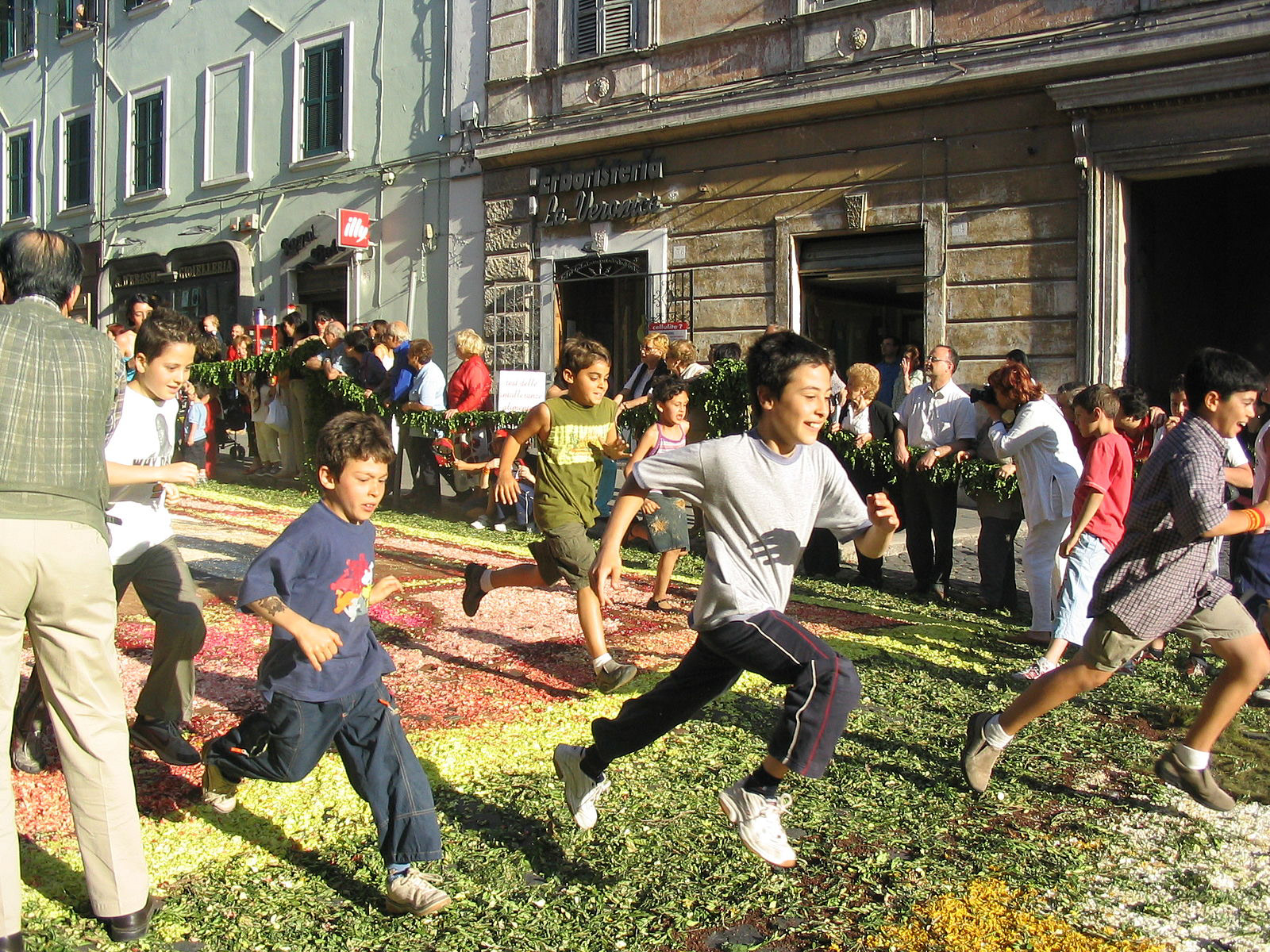 The Infiorata Festival in Italy sees entire roads and paths filled with designs made from sand, coffee grounds, limestone, flowers, pebbles, and other materials. Also a celebration of impermenance, the neighborhood kids are allowed to gleefully mess up all the drawings once the festival is over, in a tradition called "Il spallamento"
