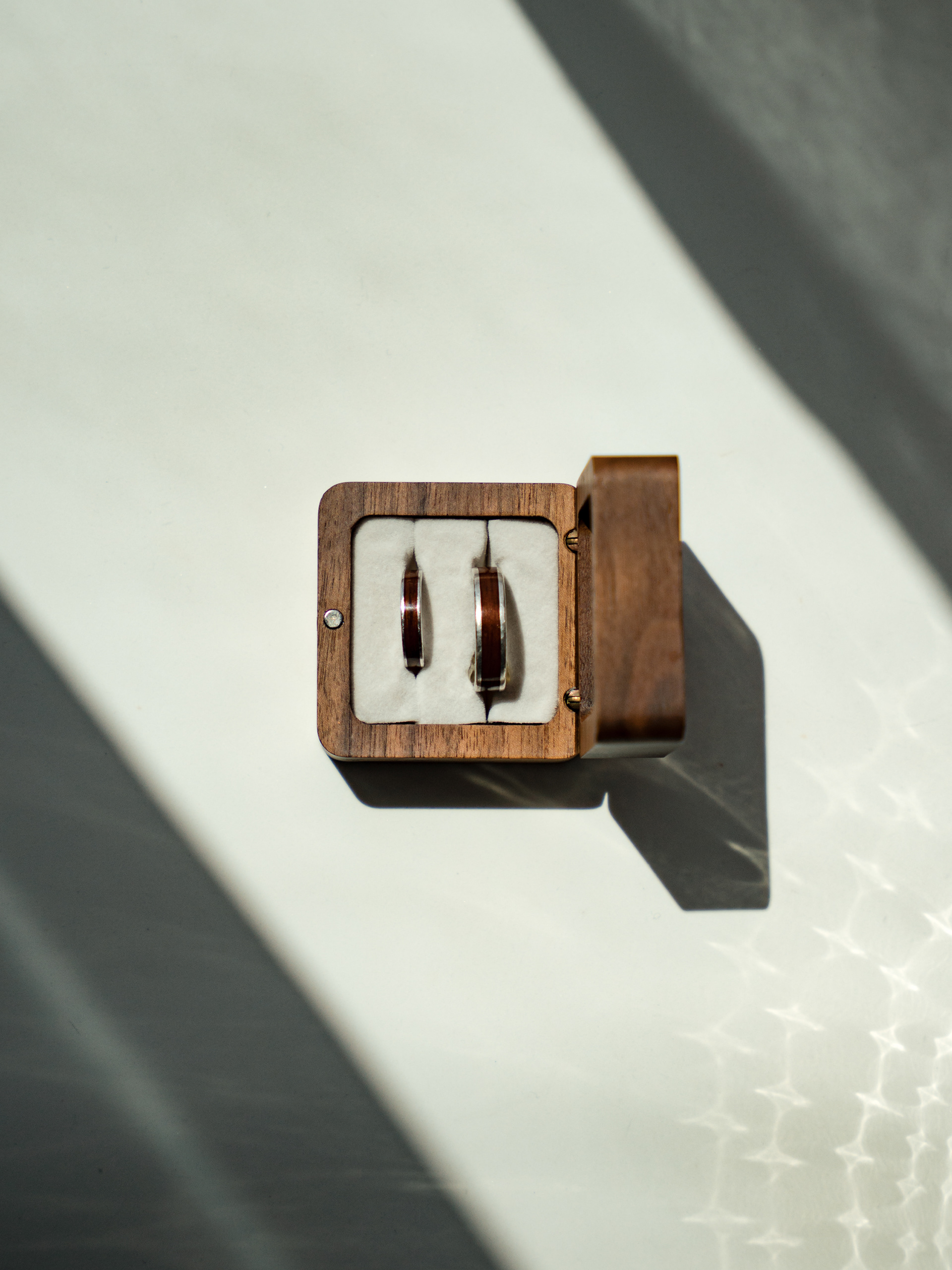 Wedding ring in a wooden ring box at Hard Rock Hotel in Daytona Beach, FL.