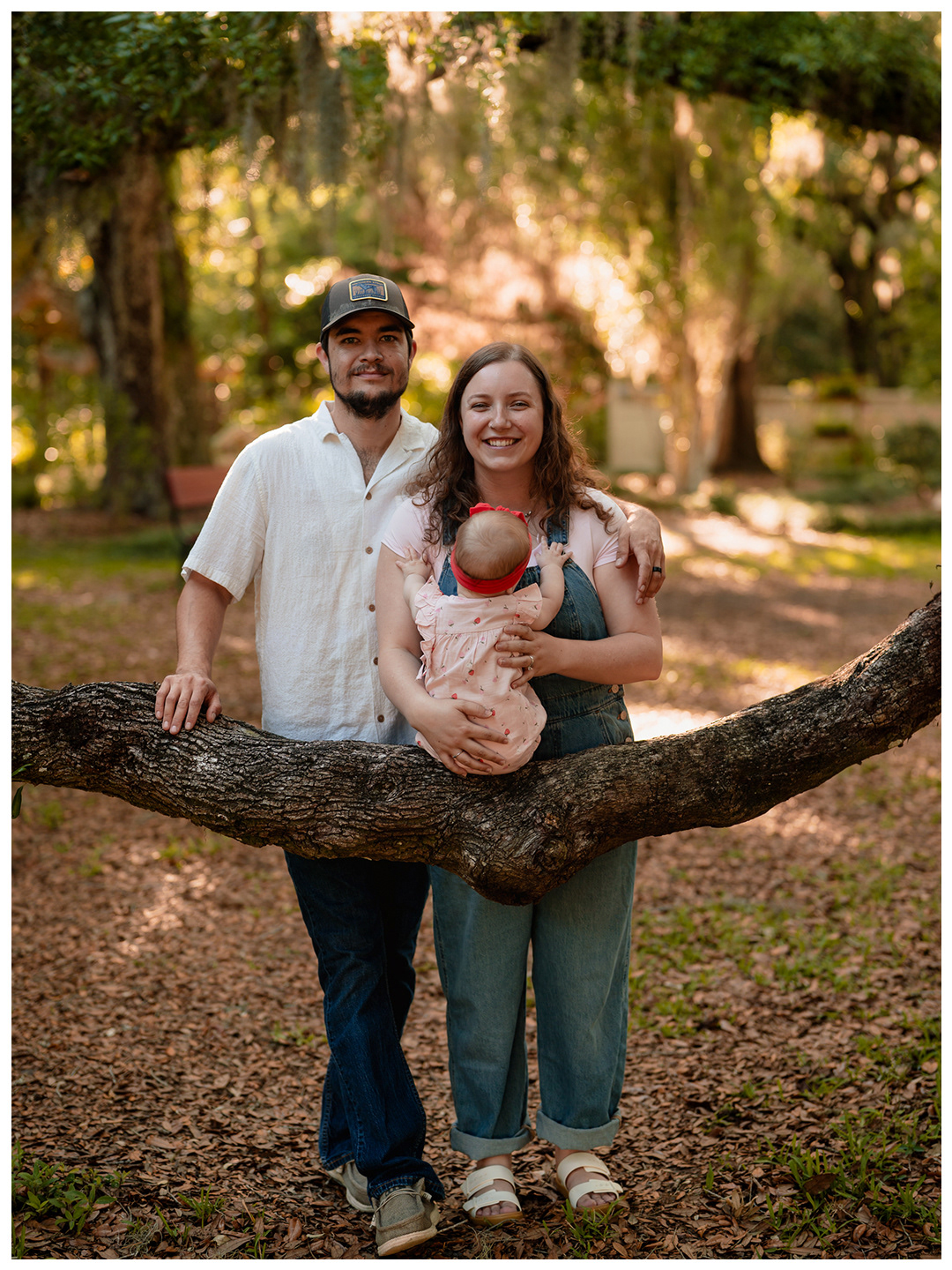 Port Orange family photography session at Dunlawton Sugar Mill Gardens with parents and baby in natural light