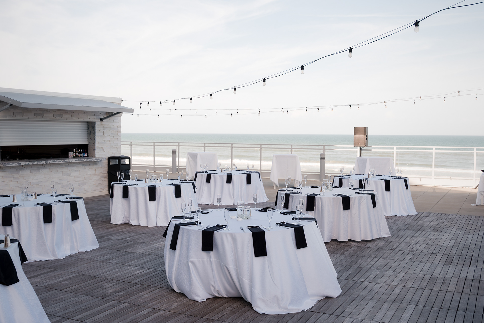 Outdoor wedding reception setup on the deck at Hard Rock Hotel Daytona Beach.