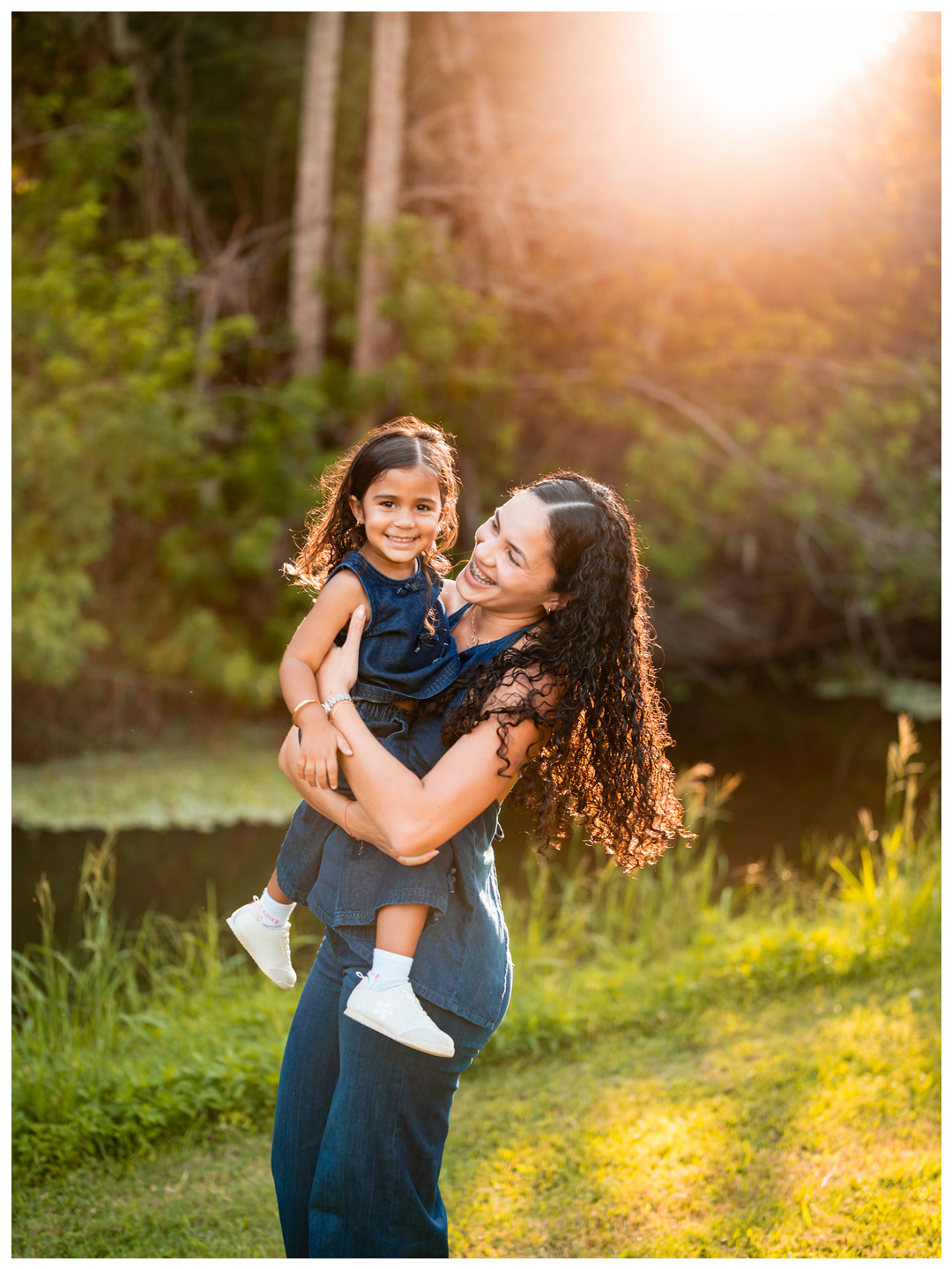 Mother and daughter portrait with lens flare at Buschman Park in Port Orange