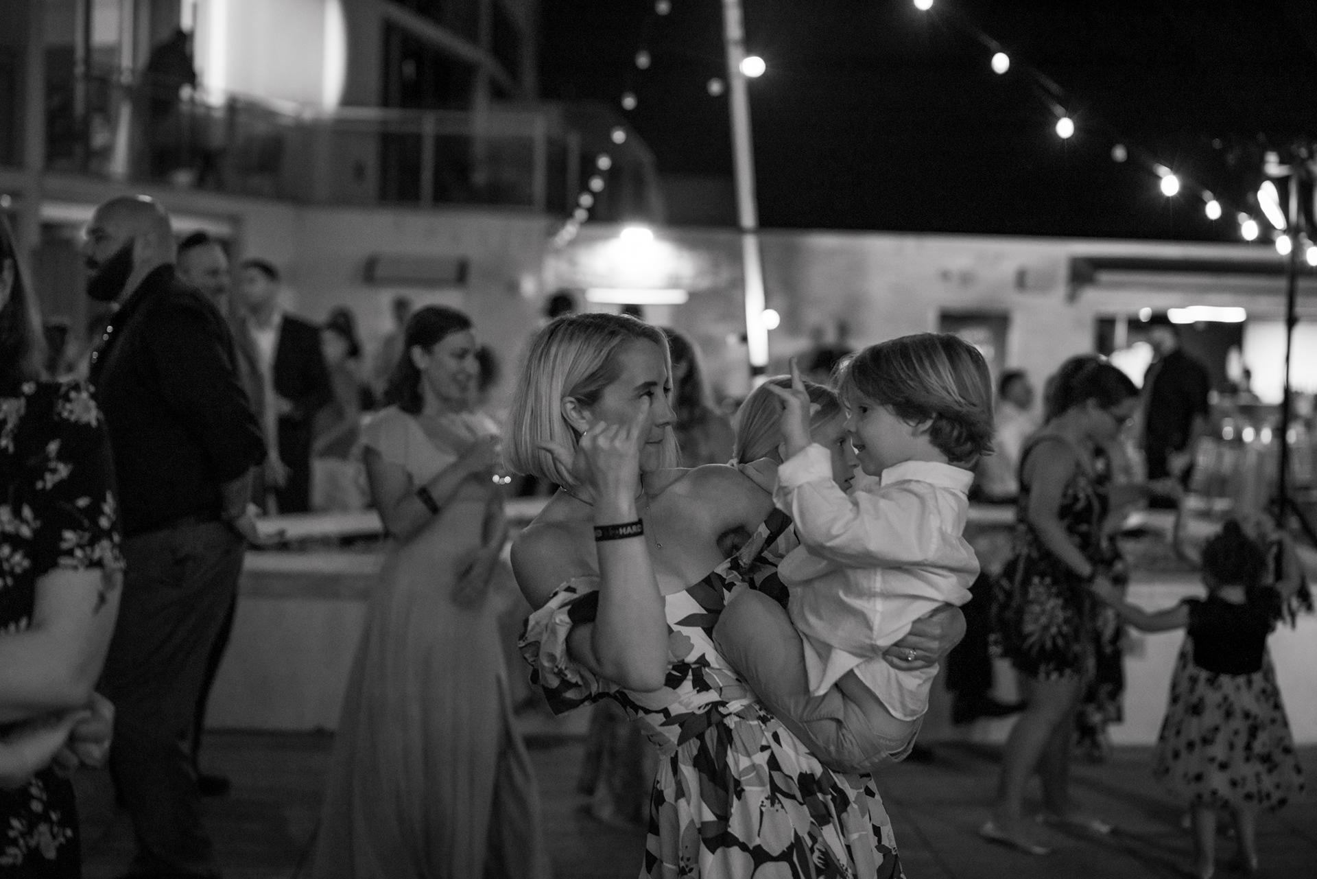Candid reception moment during an outdoor wedding at Hard Rock Hotel Daytona Beach.