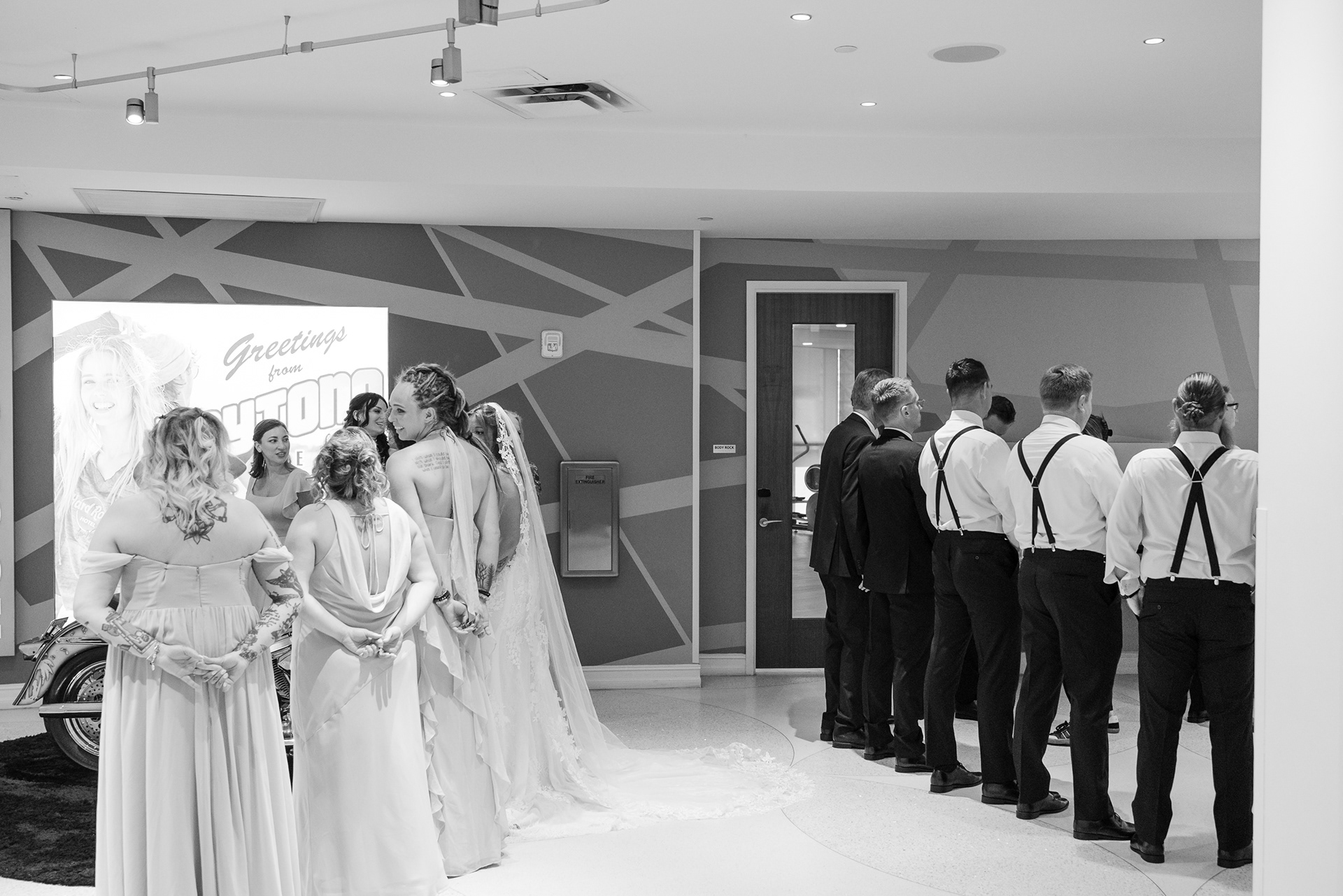 Black and white wedding party ceremony lineup at Hard Rock Hotel Daytona Beach.
