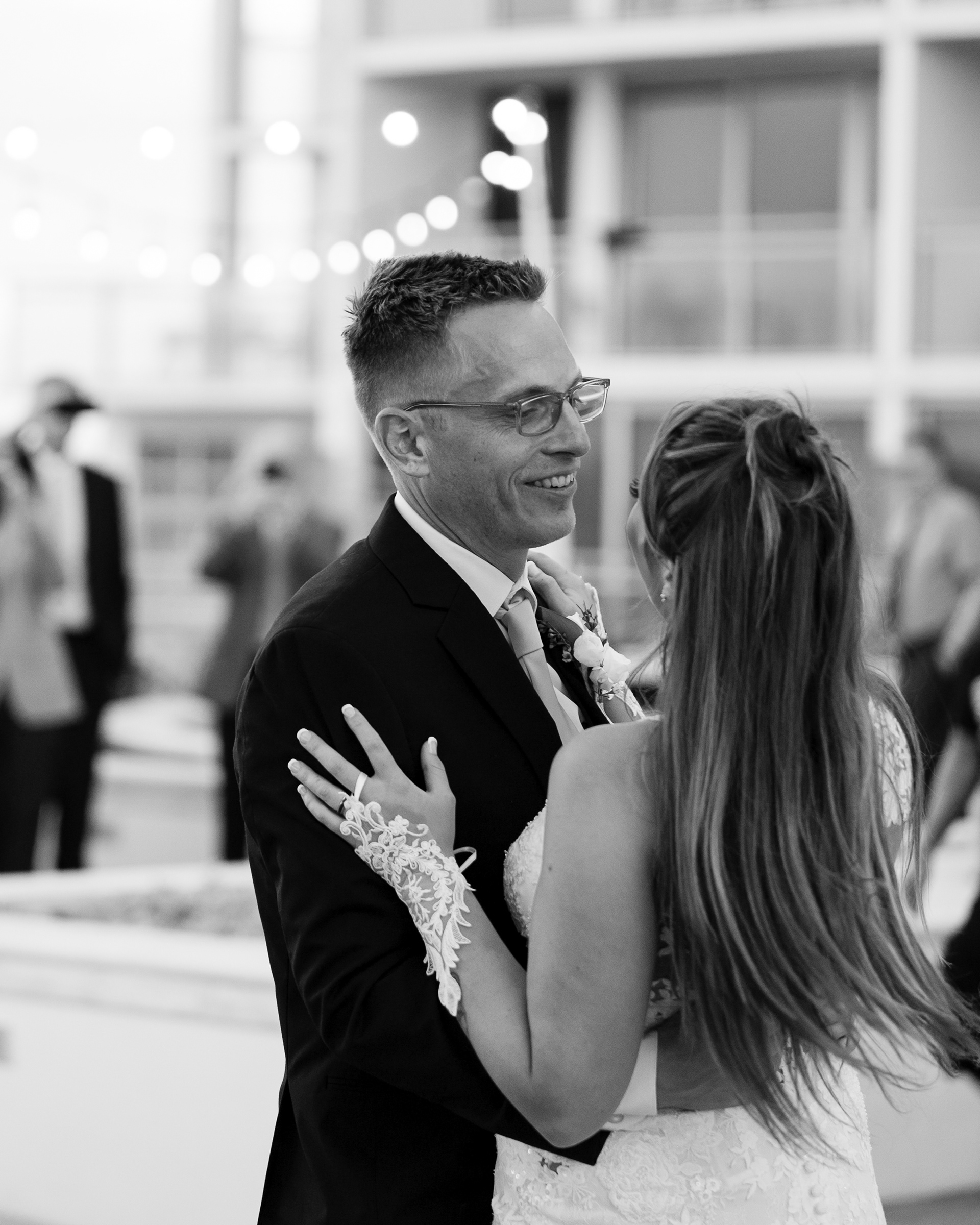Black and white close up of the bride and groom during their Daytona Beach wedding.