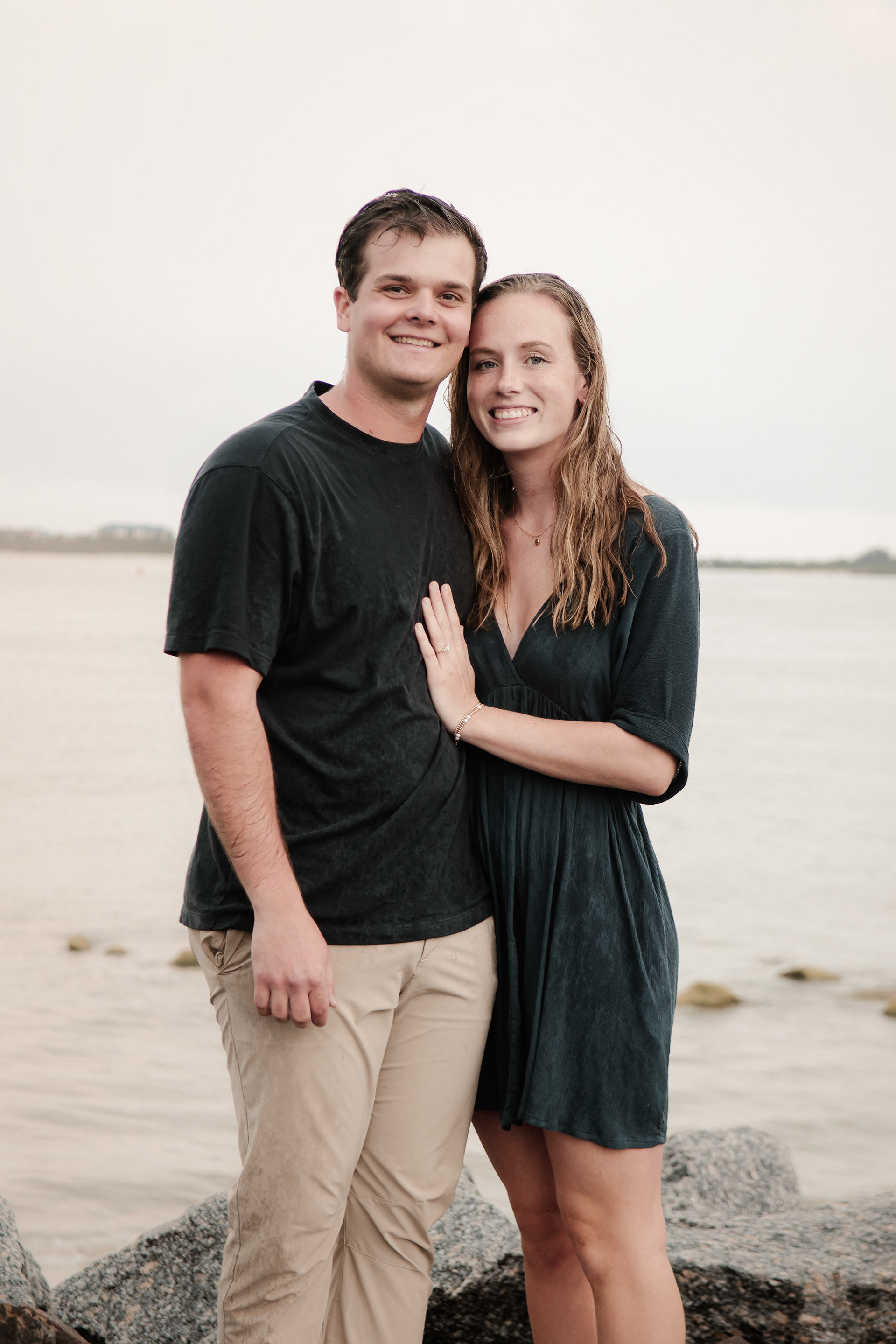 Couple portrait on the rocks during Ponce Inlet engagement photography session