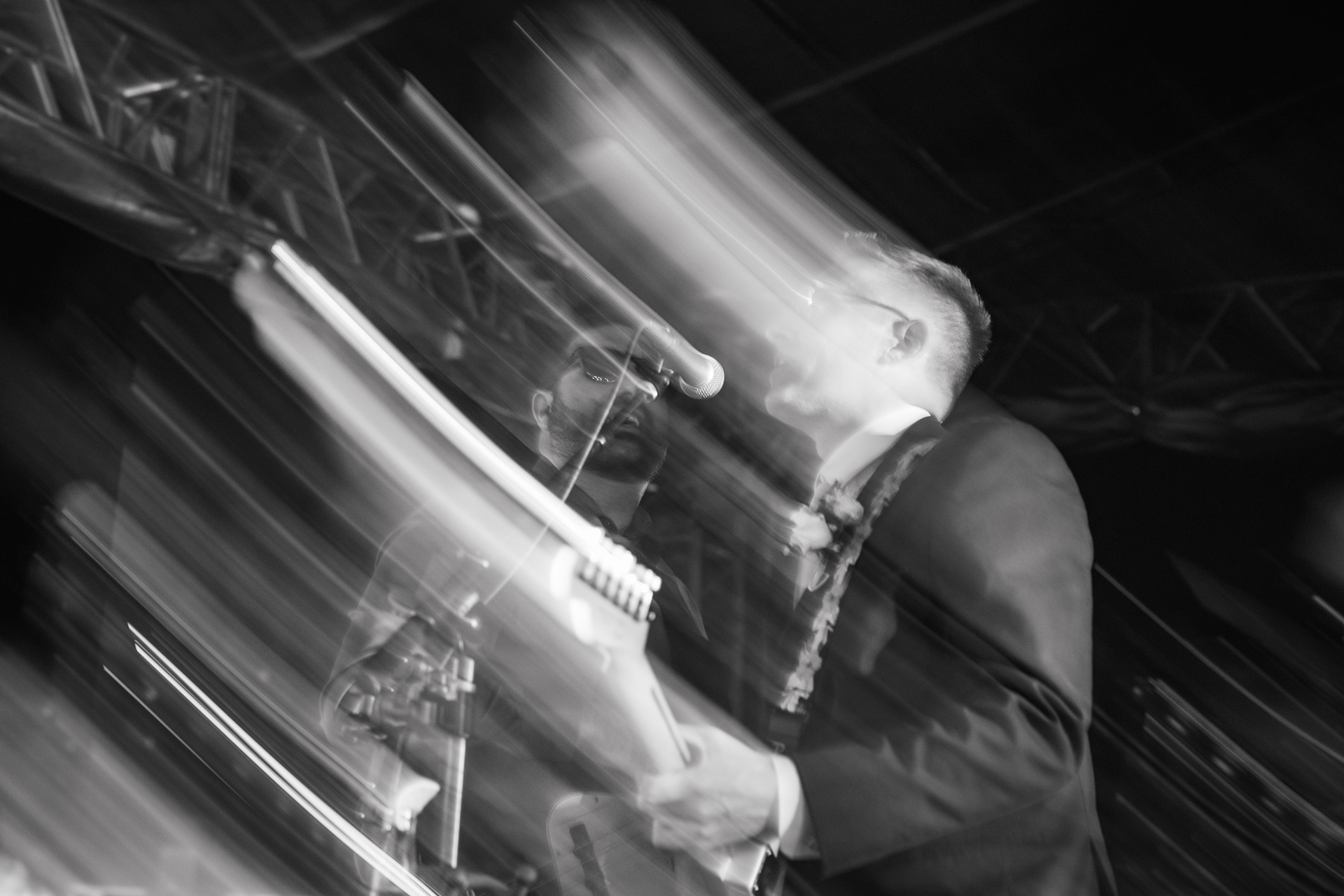 Black and white concert lighting during a wedding reception at Hard Rock Hotel Daytona Beach.