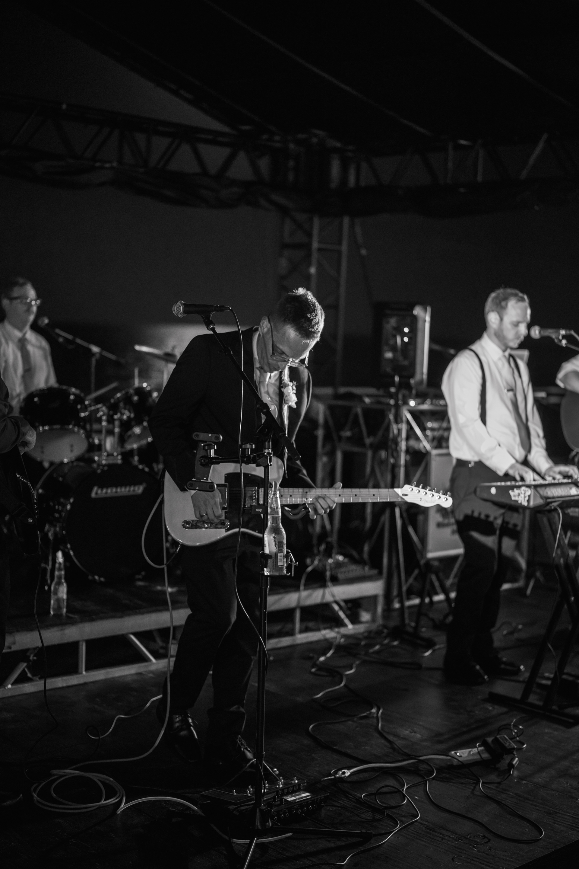Black and white live band performance during a Daytona Beach wedding reception.