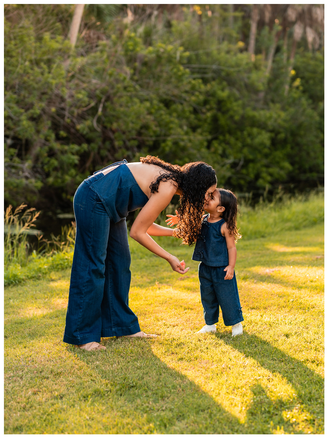 Port Orange mother and daughter photos with warm sunset light and long shadows