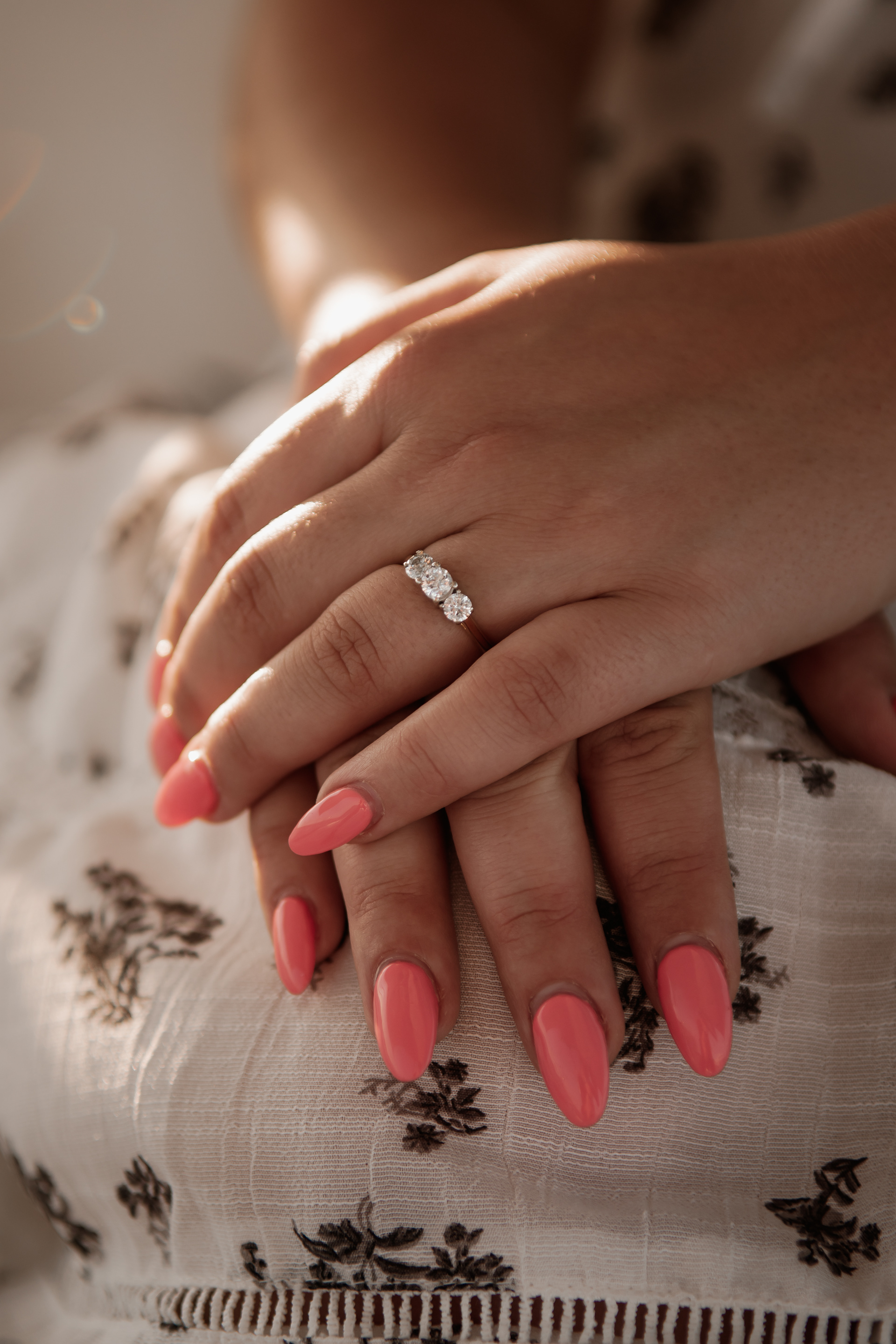 Close-up engagement ring detail photo during Daytona Beach sailboat engagement session