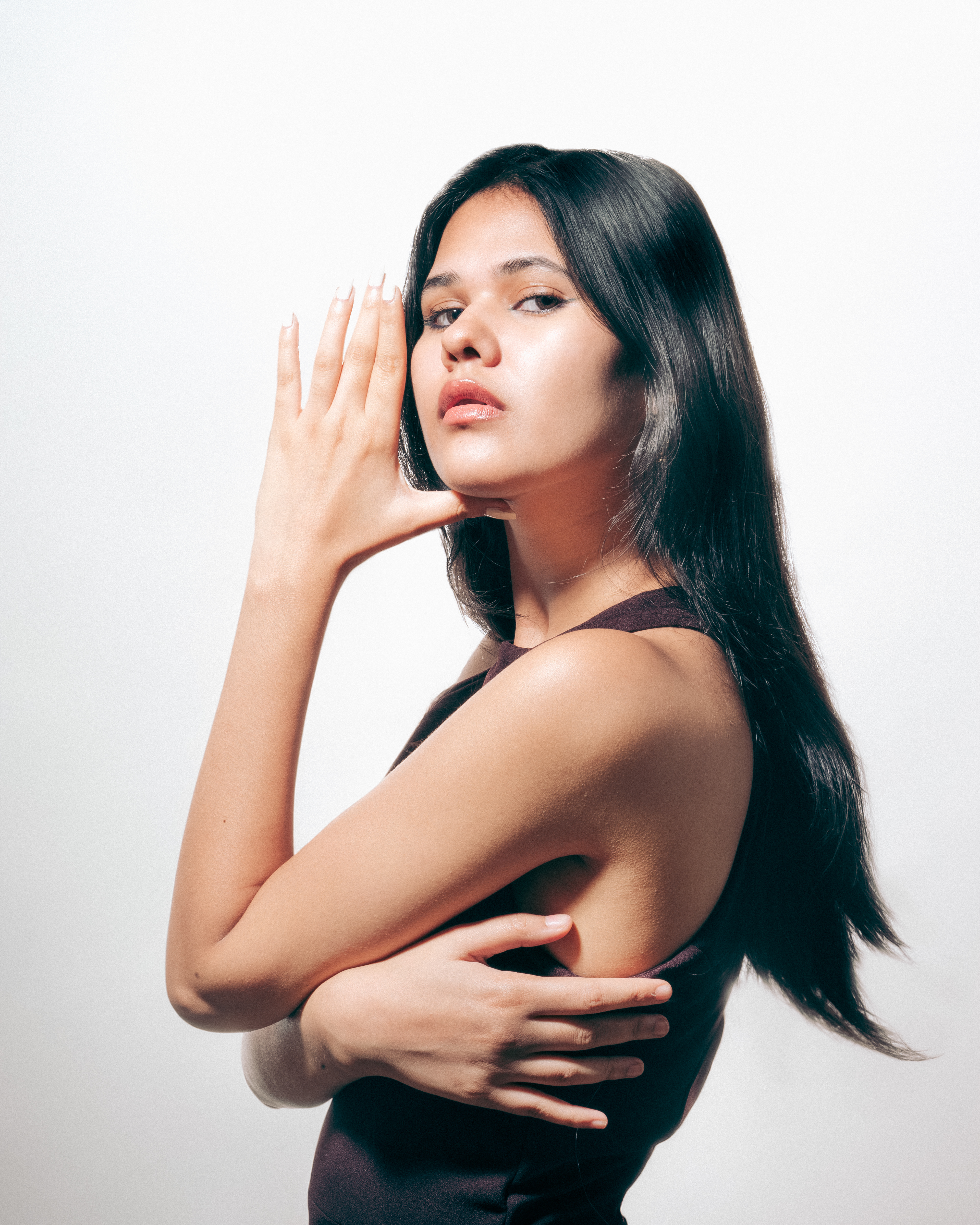  "Stylish model in contemporary fashion attire, exuding confidence and sophistication."