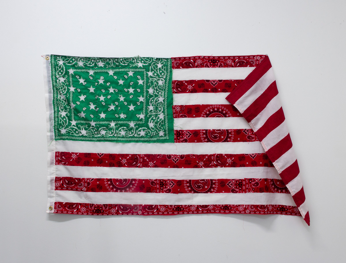 "RESISTANCE FLAG", red and green bandanas sewn on American flag, 36 x 60 inches, 2023. 