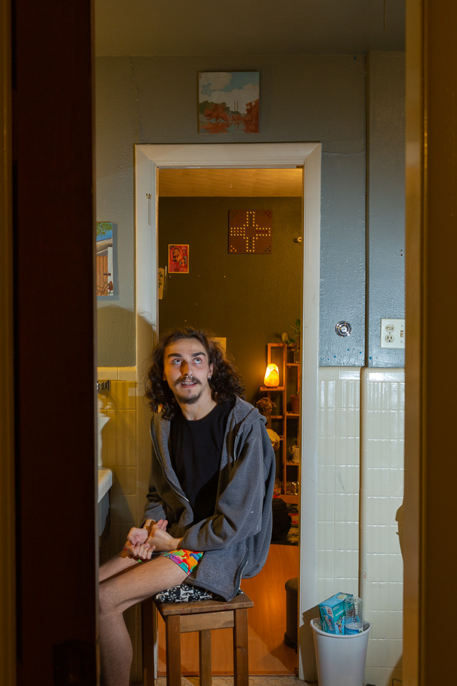 Billy in their restroom, 2022