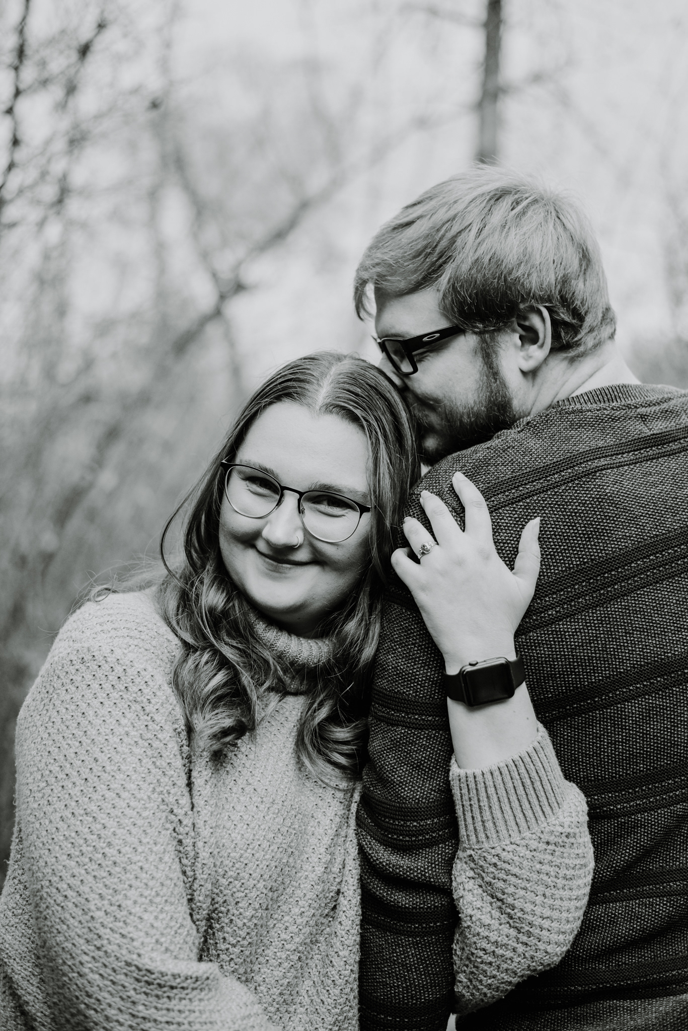 A snuggling up on A's shoulder.