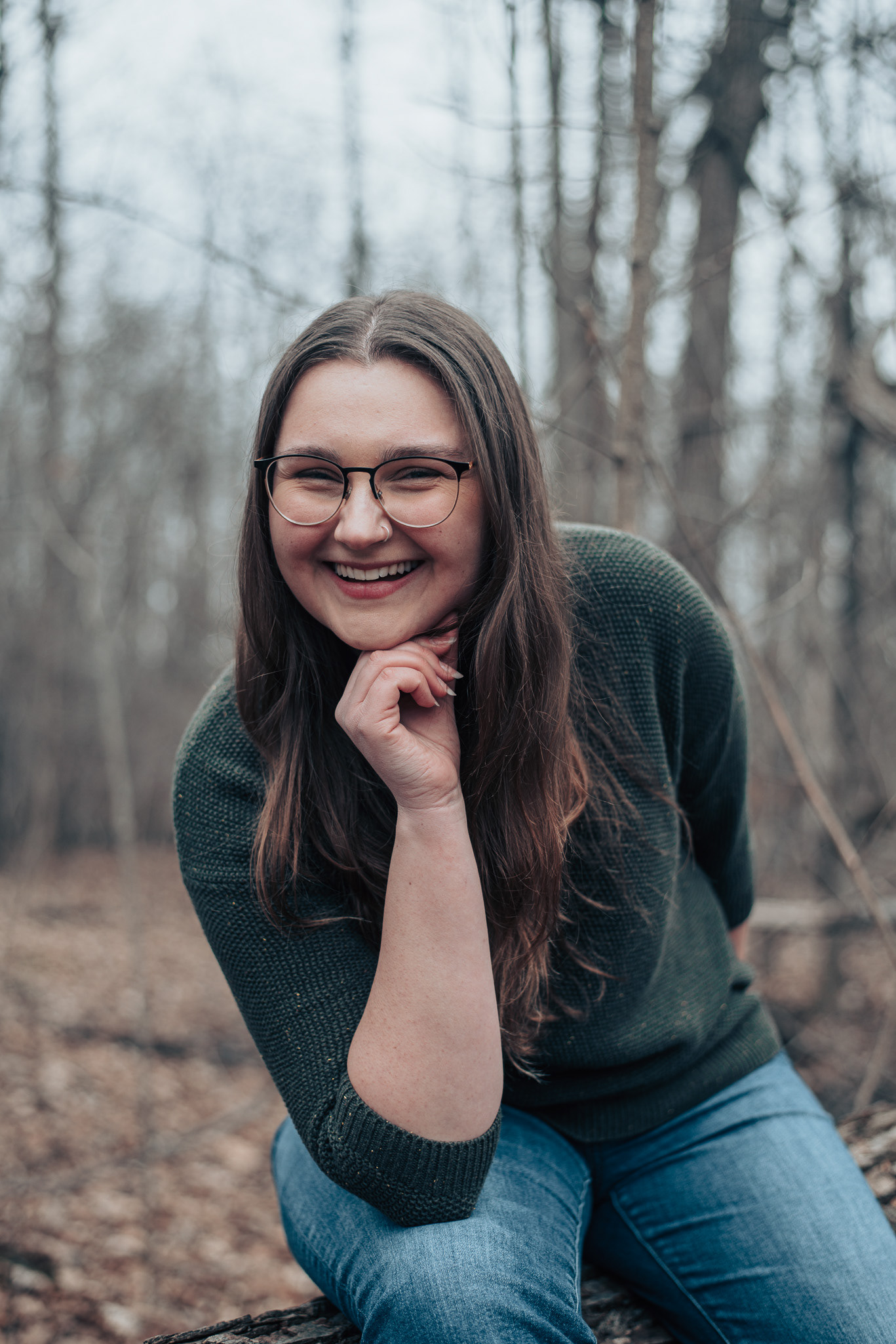 Allison leaning with her head on her hand.