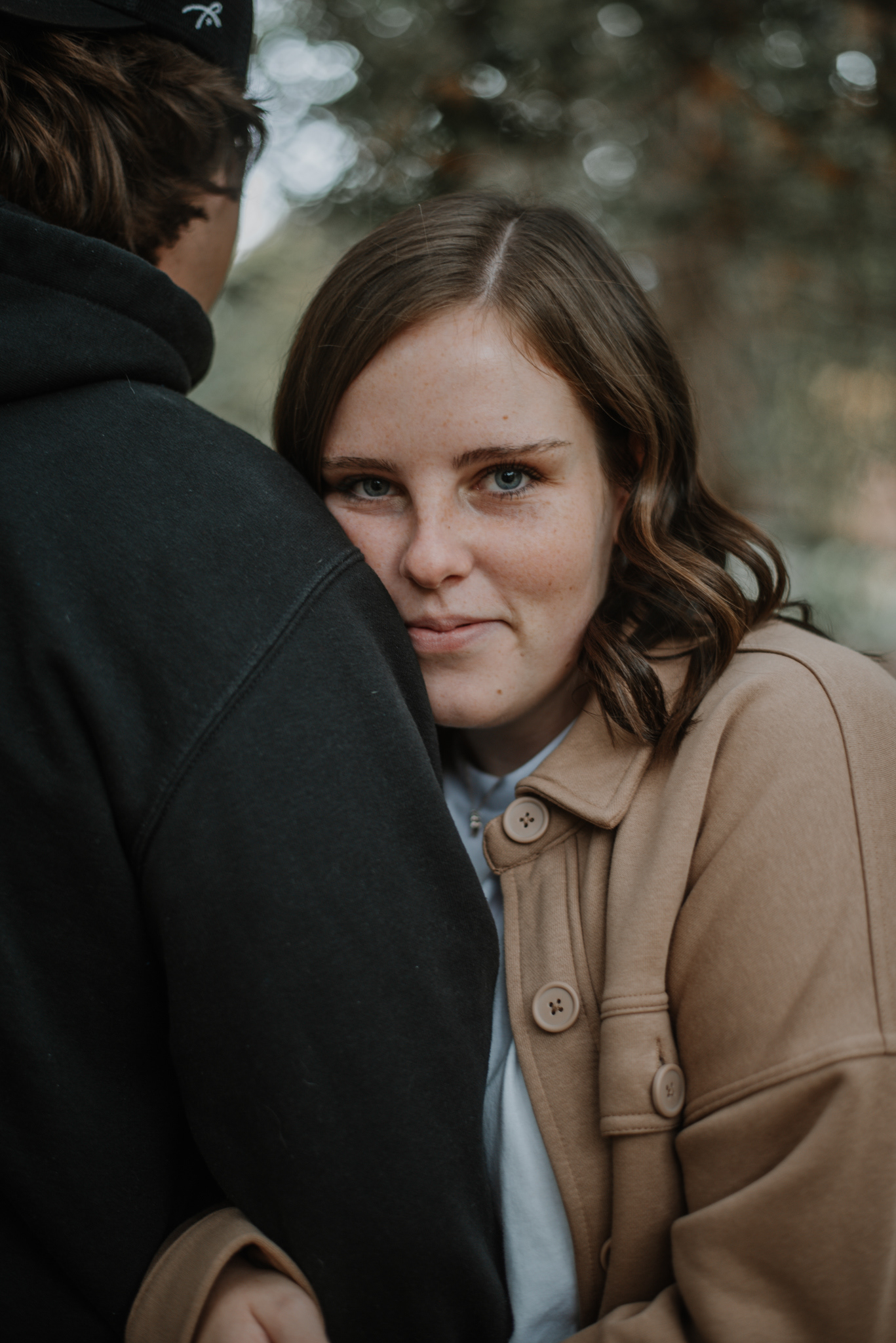 A snuggled up to J's arm.