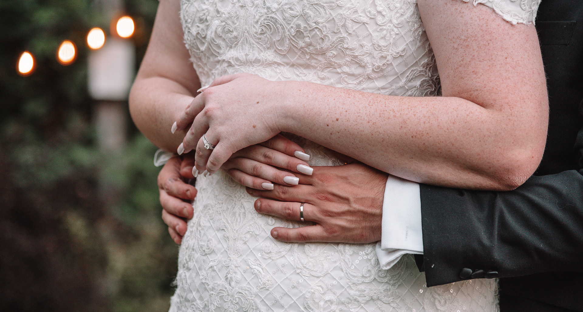 Close up of J holding K.