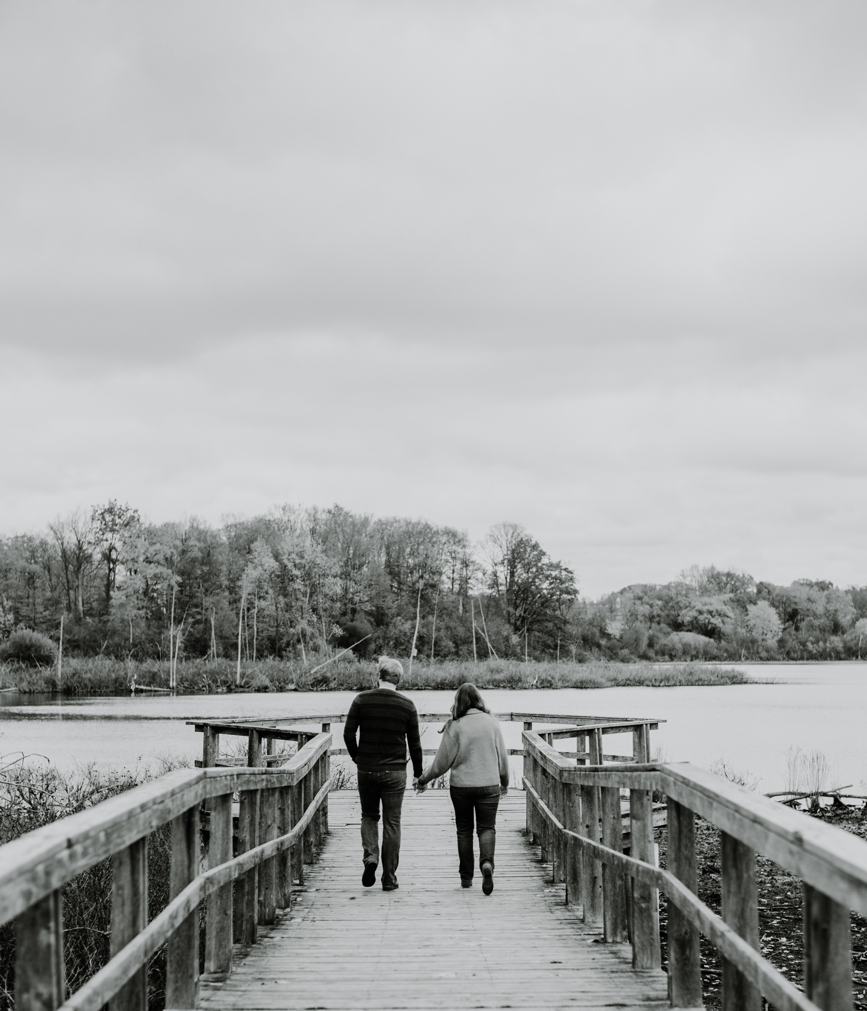 A & A walking on a bridge.