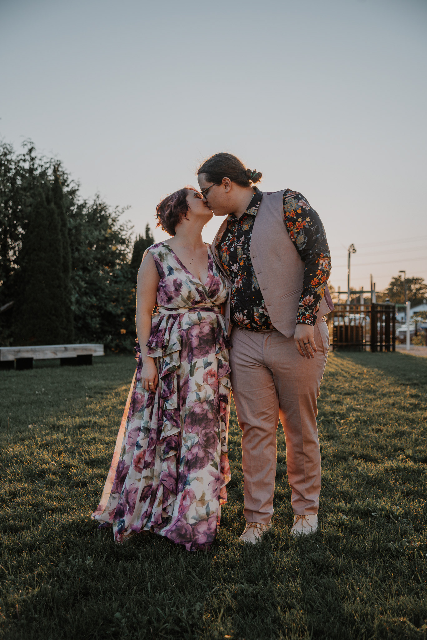 S & B kissing at sunset.