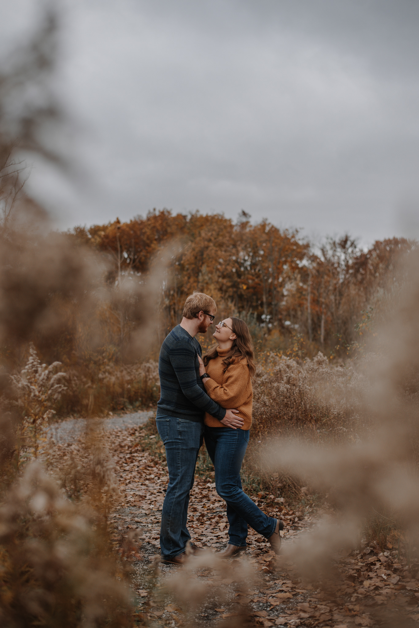 A & A framed by plants.