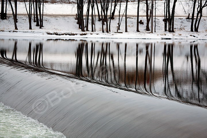 Reflections above a roller dam