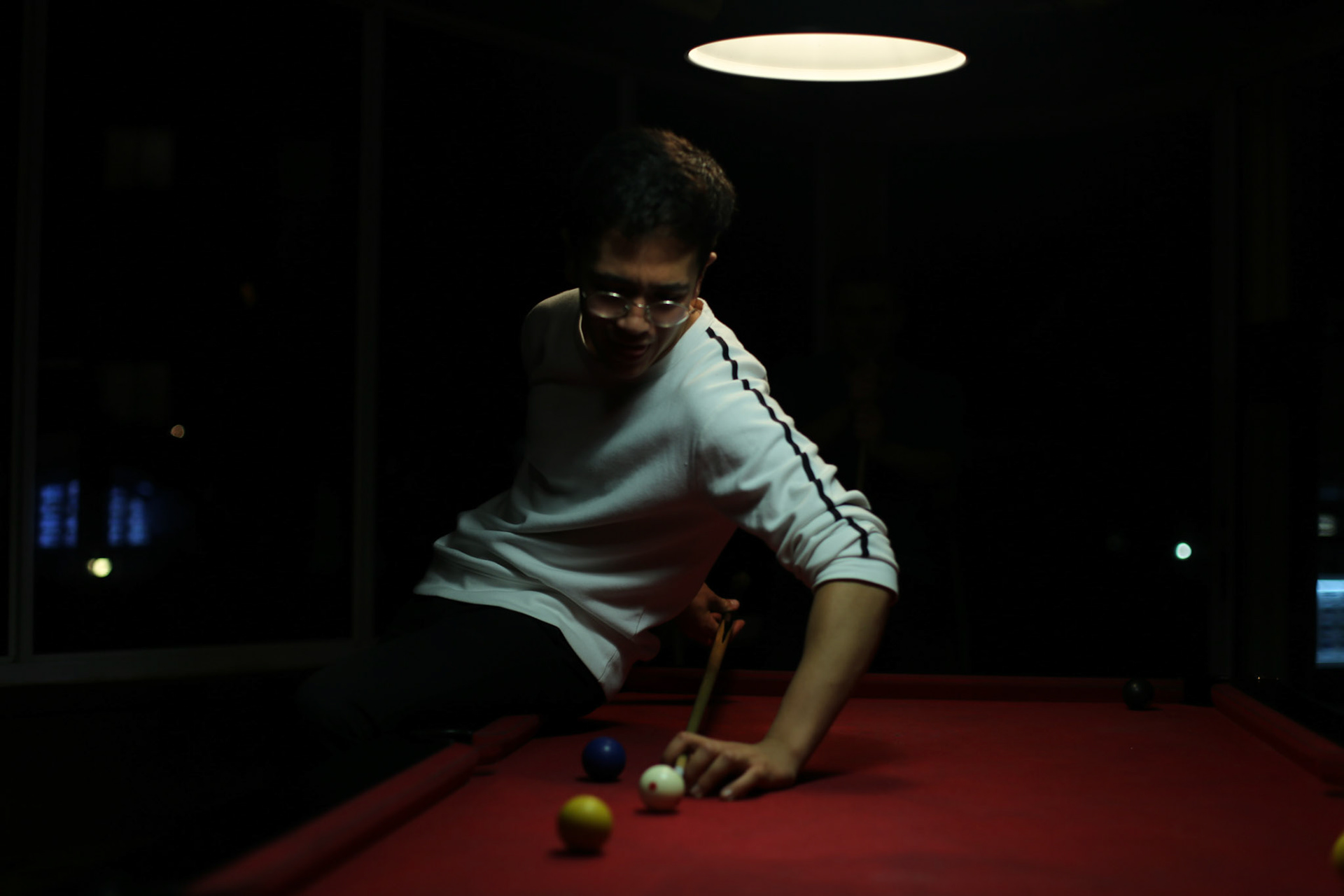 JD playing pool