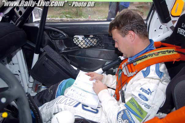 2004 World Rally ChampionshipRally Argentina, July 15-18, 2004Stephane Prevot checks his notes in the service park.Photo:  Ralph Hardwick