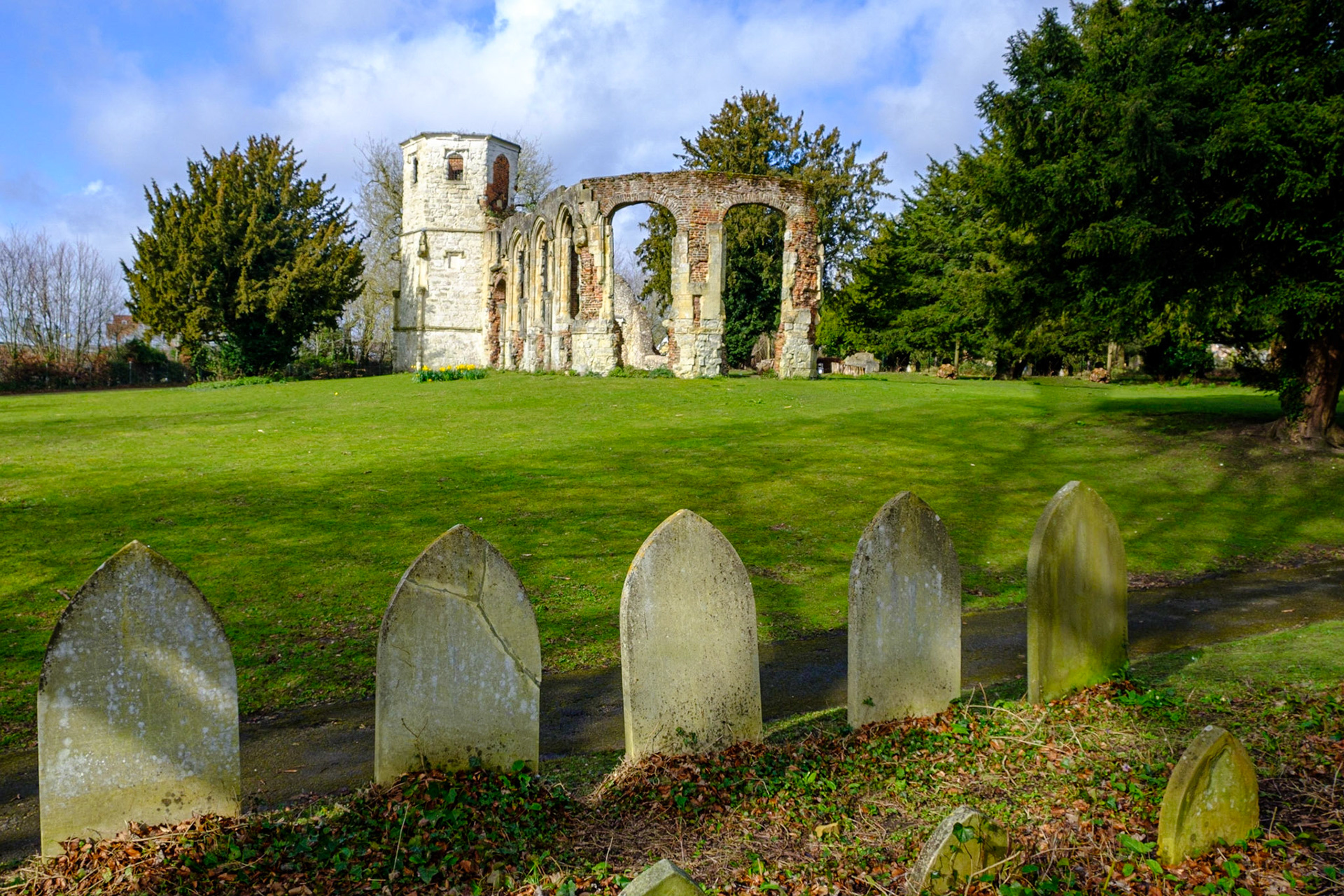 Old gravestones guard the ruins