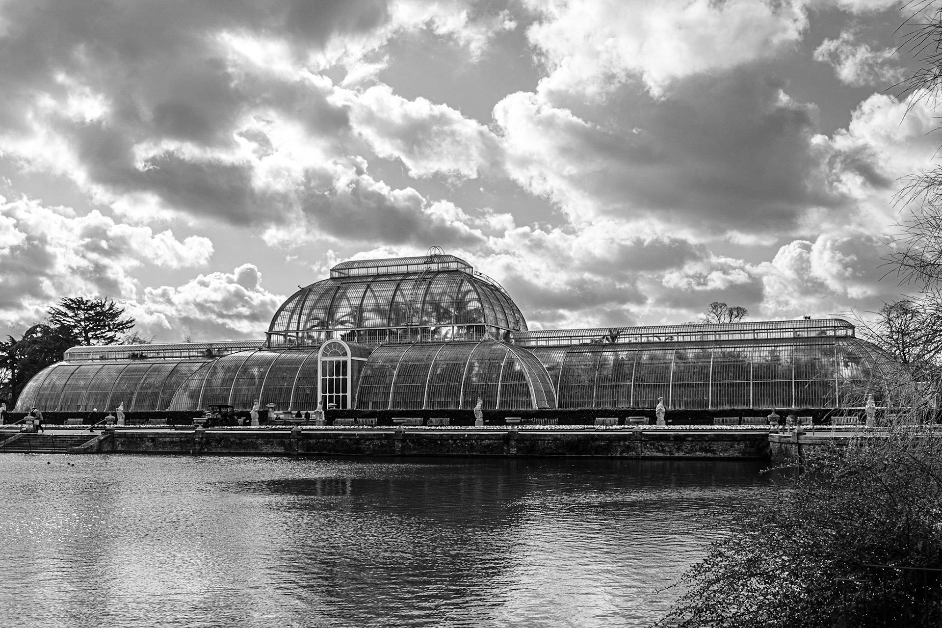 The palm house across the lake