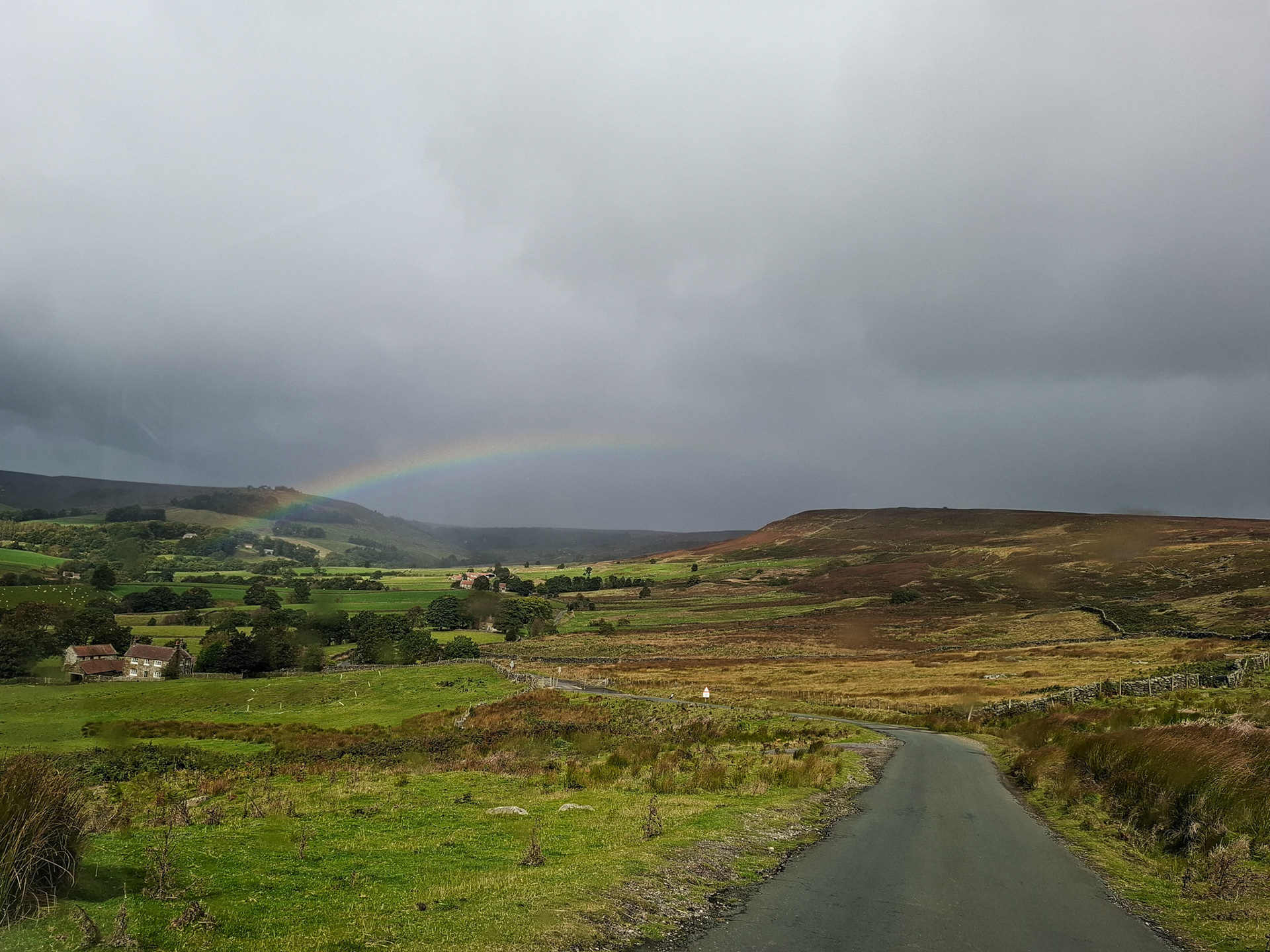 Rainbow over the moorland road