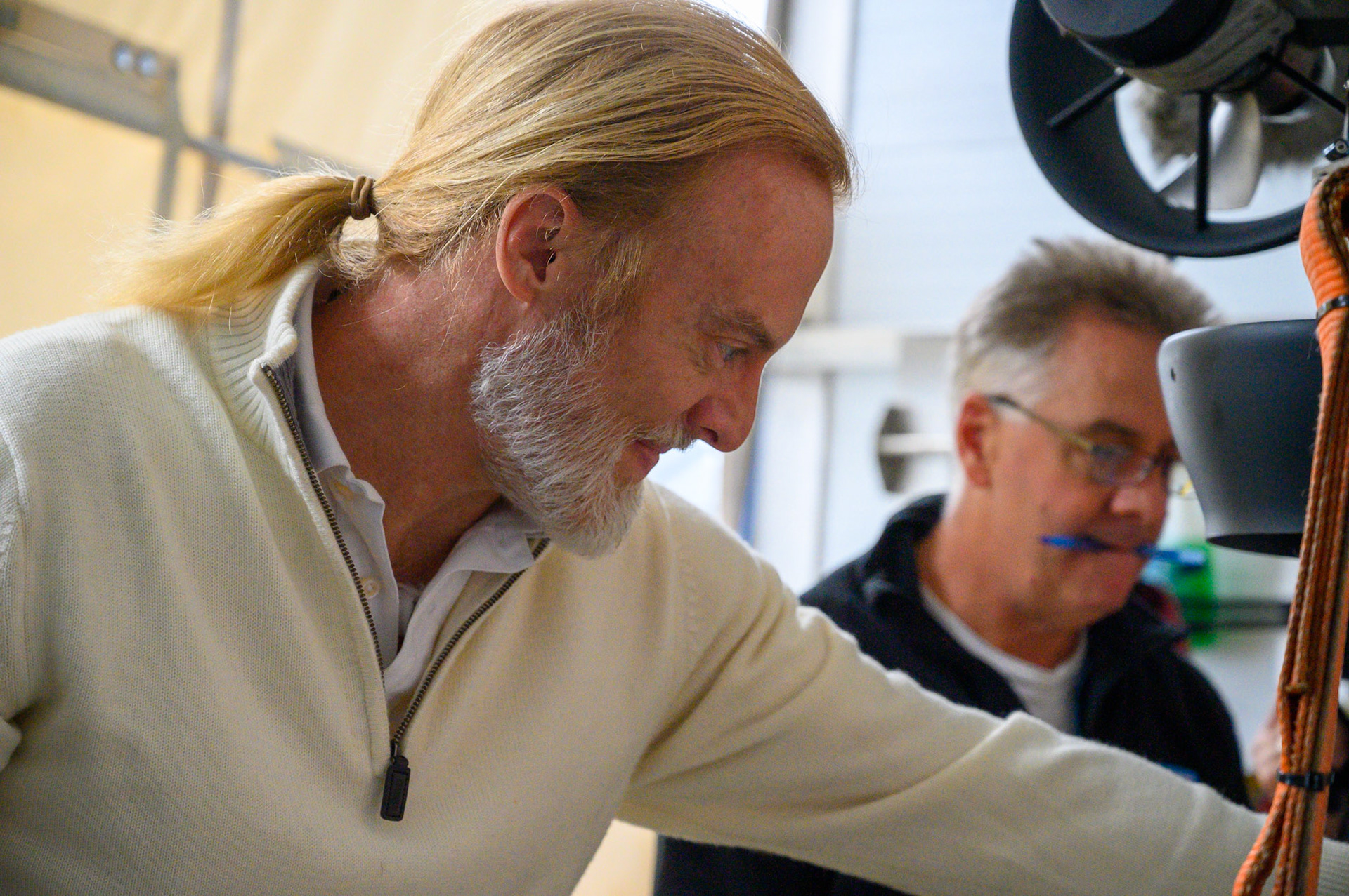 Patrick Lahey in background