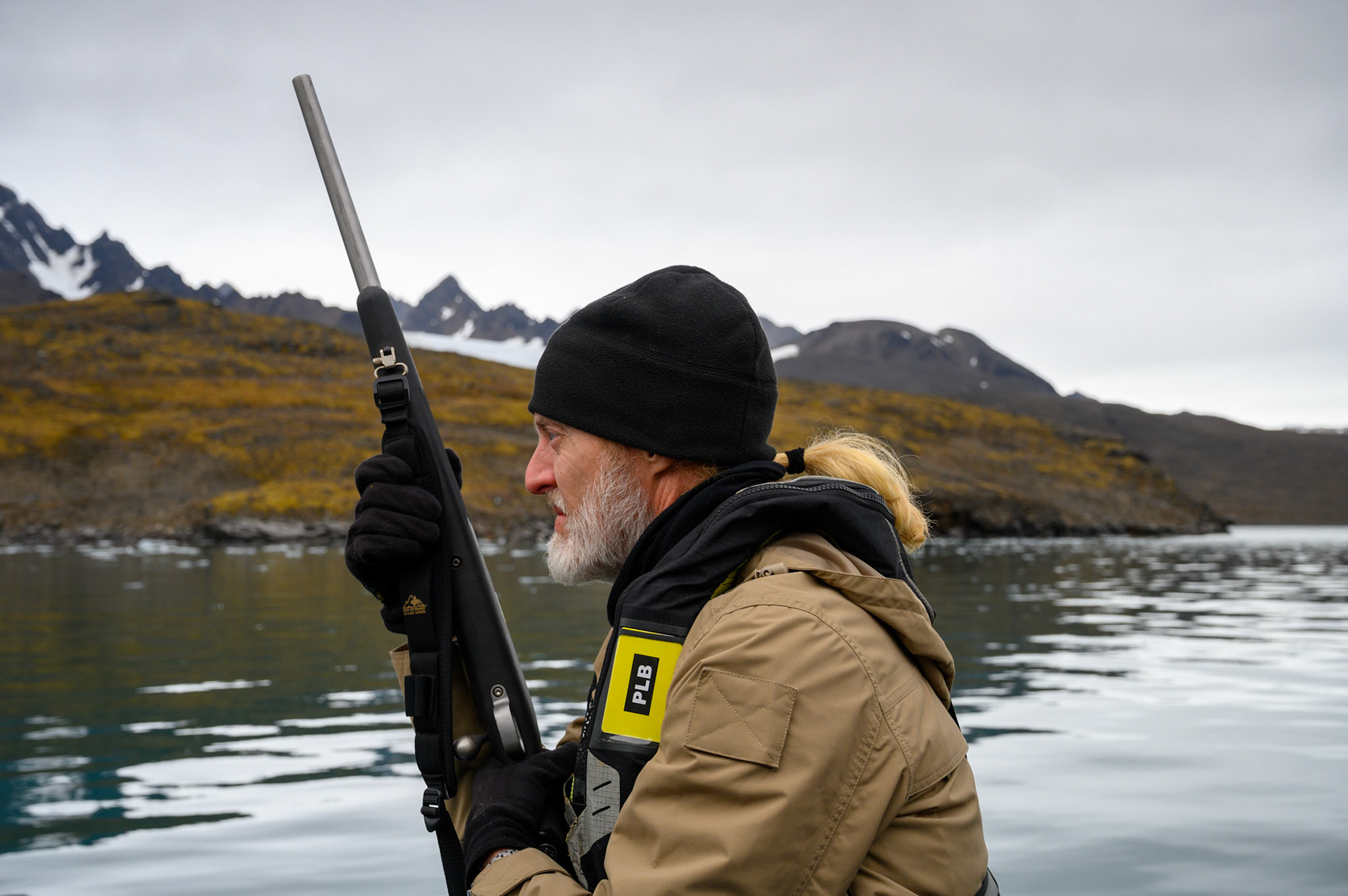 Vescovo armed with rifle during Spitsbergen Island excursion