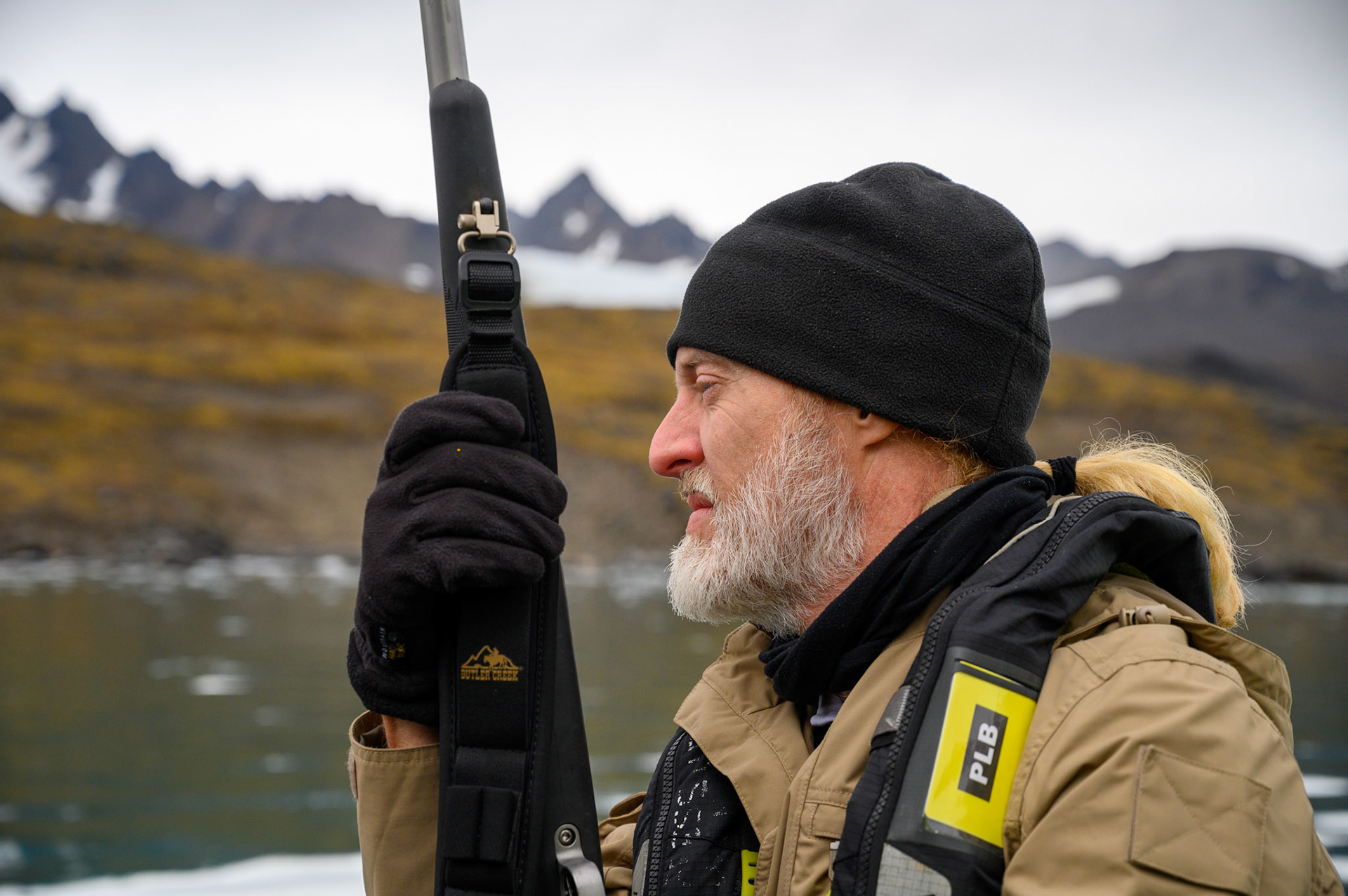 Vescovo armed with rifle during Spitsbergen Island excursion