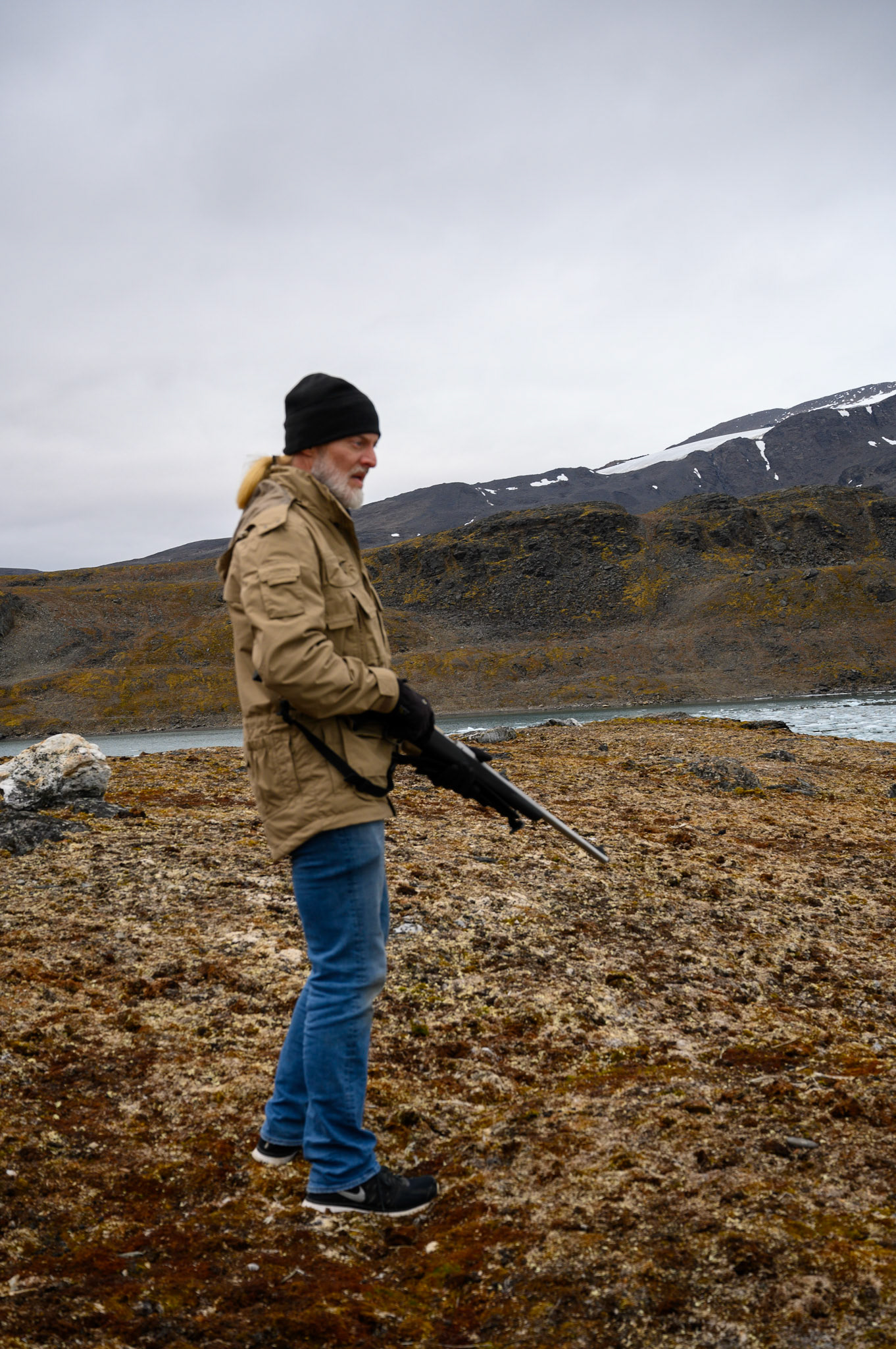 Vescovo armed with rifle during Spitsbergen Island excursion