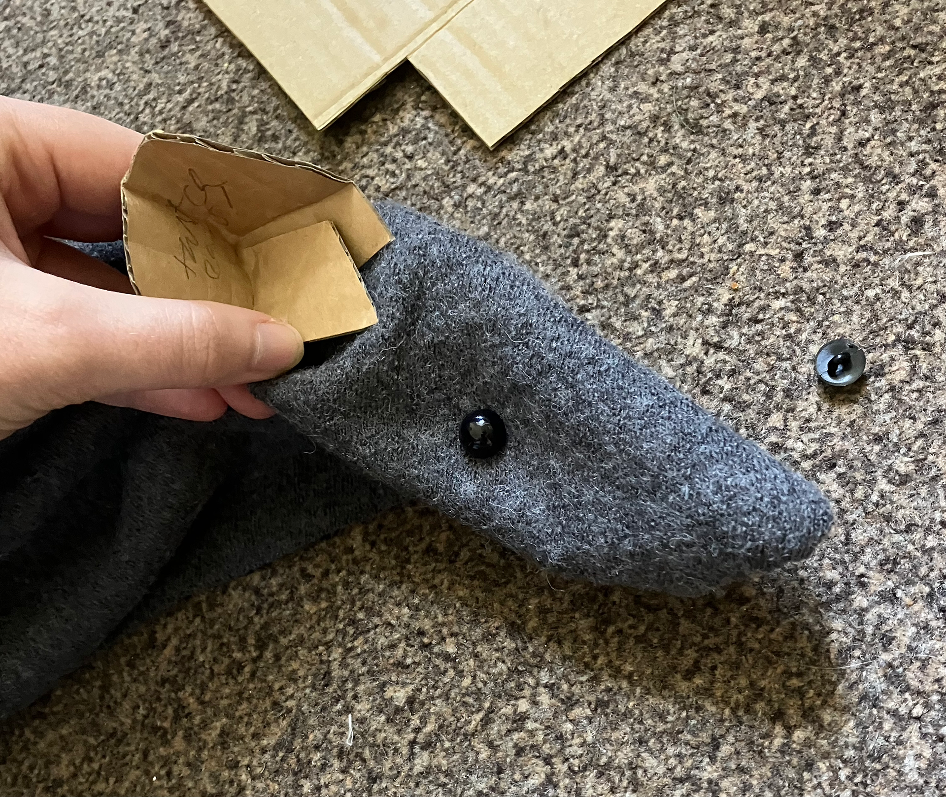 Testing fabrics - I chose this one but roughened it up with a cheese grater before finishing the puppet
