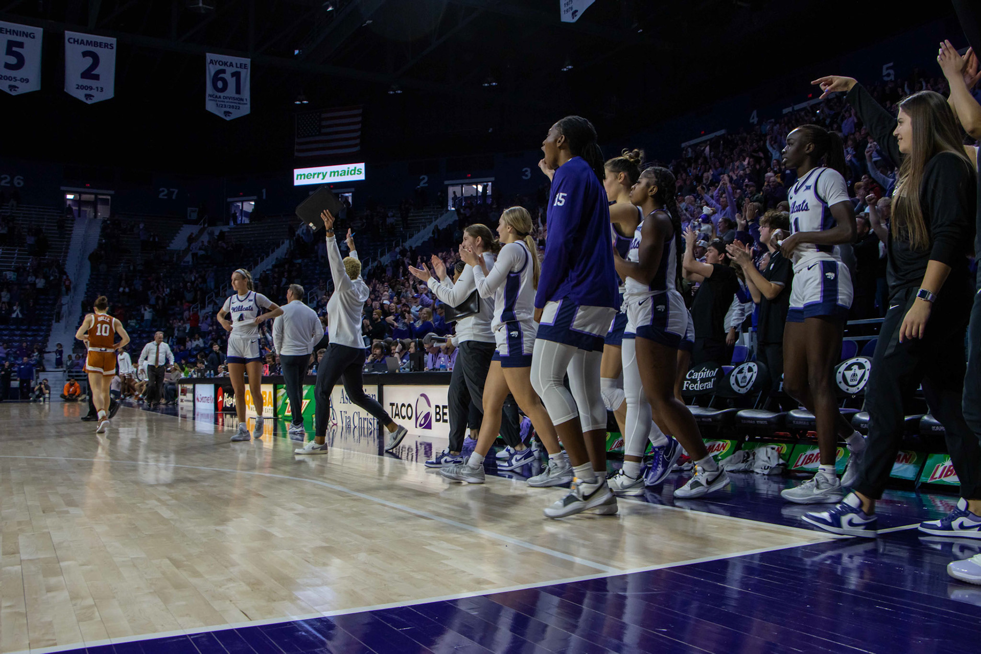 The K-State bench celebrates as the clock hits zero, finalizing K-State's win over Texas. No. 12 K-State beat No. 10 Texas 61-58 Jan. 13, 2024.