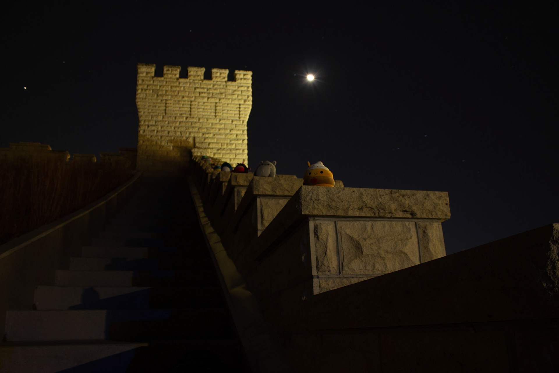 The whole Squishmallow Army gathers along the Memorial Stadium spectator wall underneath a waning crescent. The critters make for great pattern repetition and leading lines. (Included on @CarterintheStars)