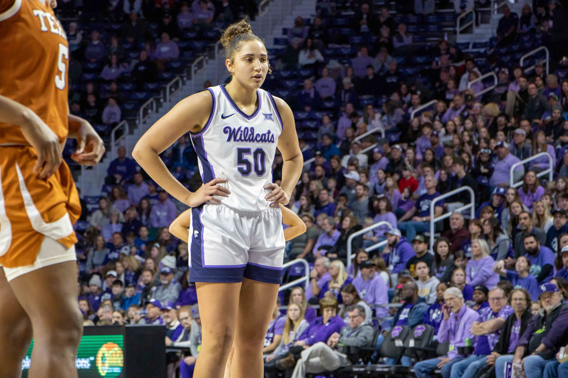Center Ayoka Lee readies herself for free throws at the end of the first quarter against Texas. Lee knocked down both free throws, scoring the final points for K-State in the period.