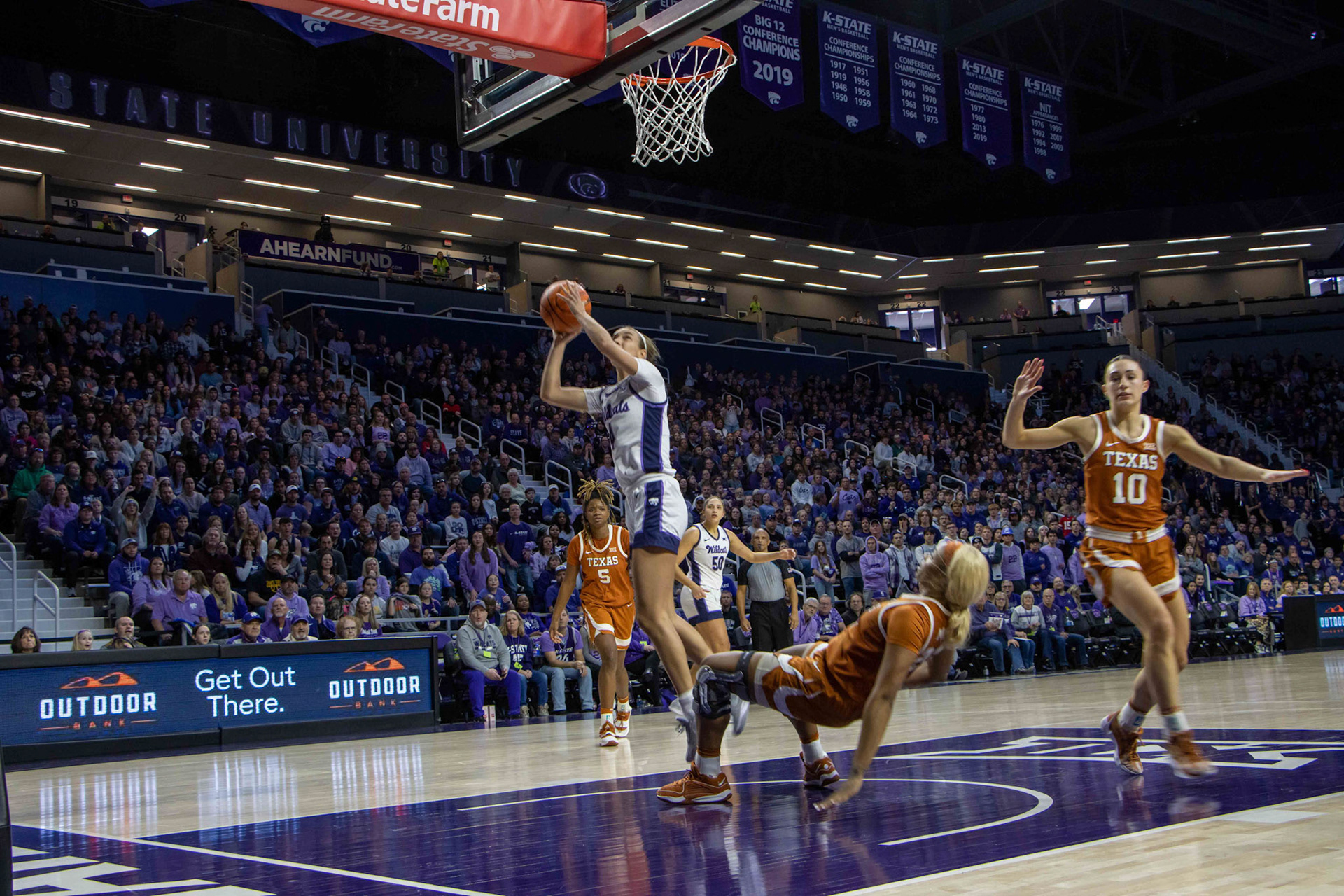 Guard Serena Sundell drops back and hits a 2 in the Jan. 13 victory over Texas. The Wildcat win keeps K-State undefeated in conference play and marks the second top-10 victory for the season. 